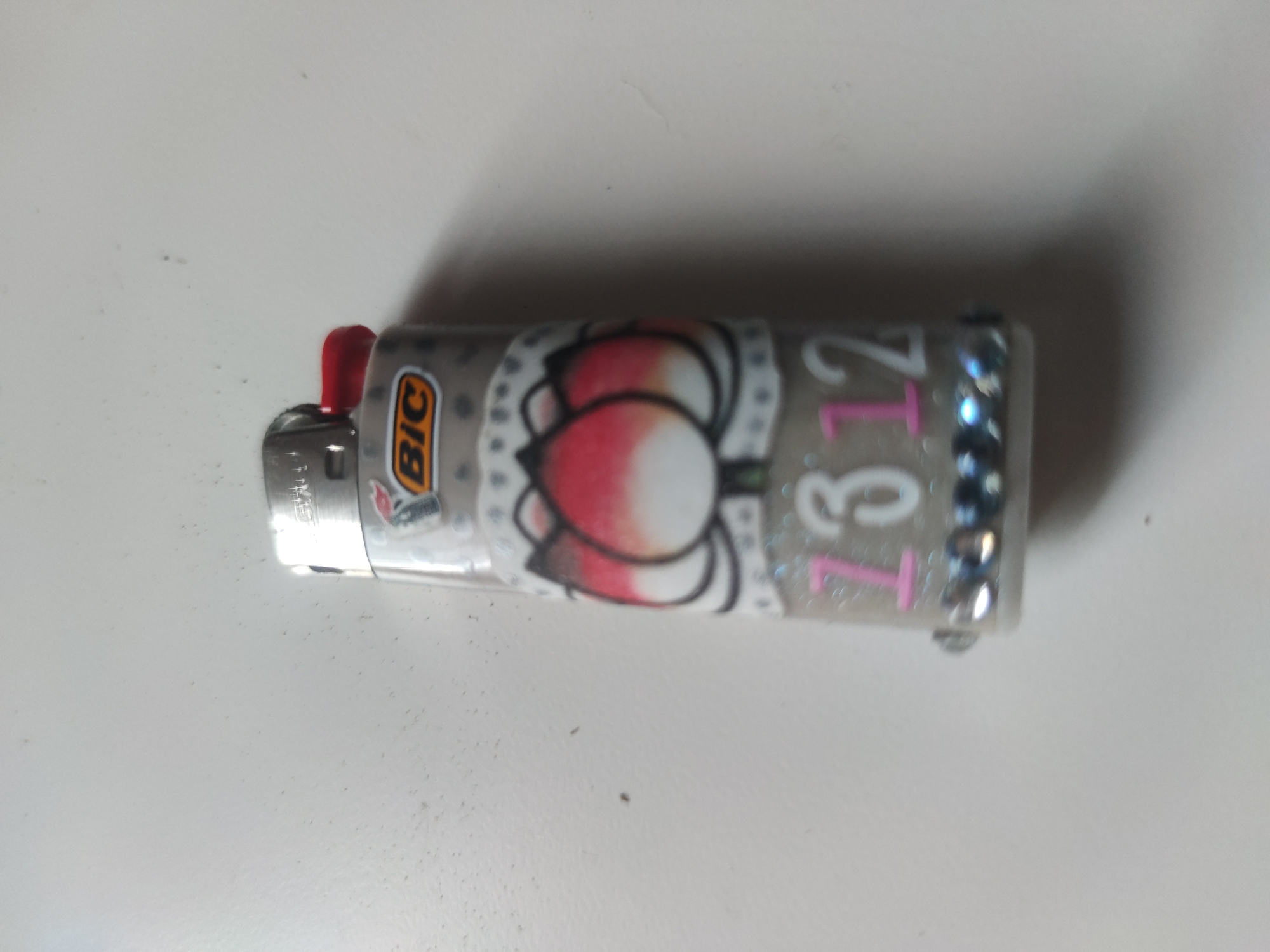 Decorative lighters spotted on white surfaces within minute timespan