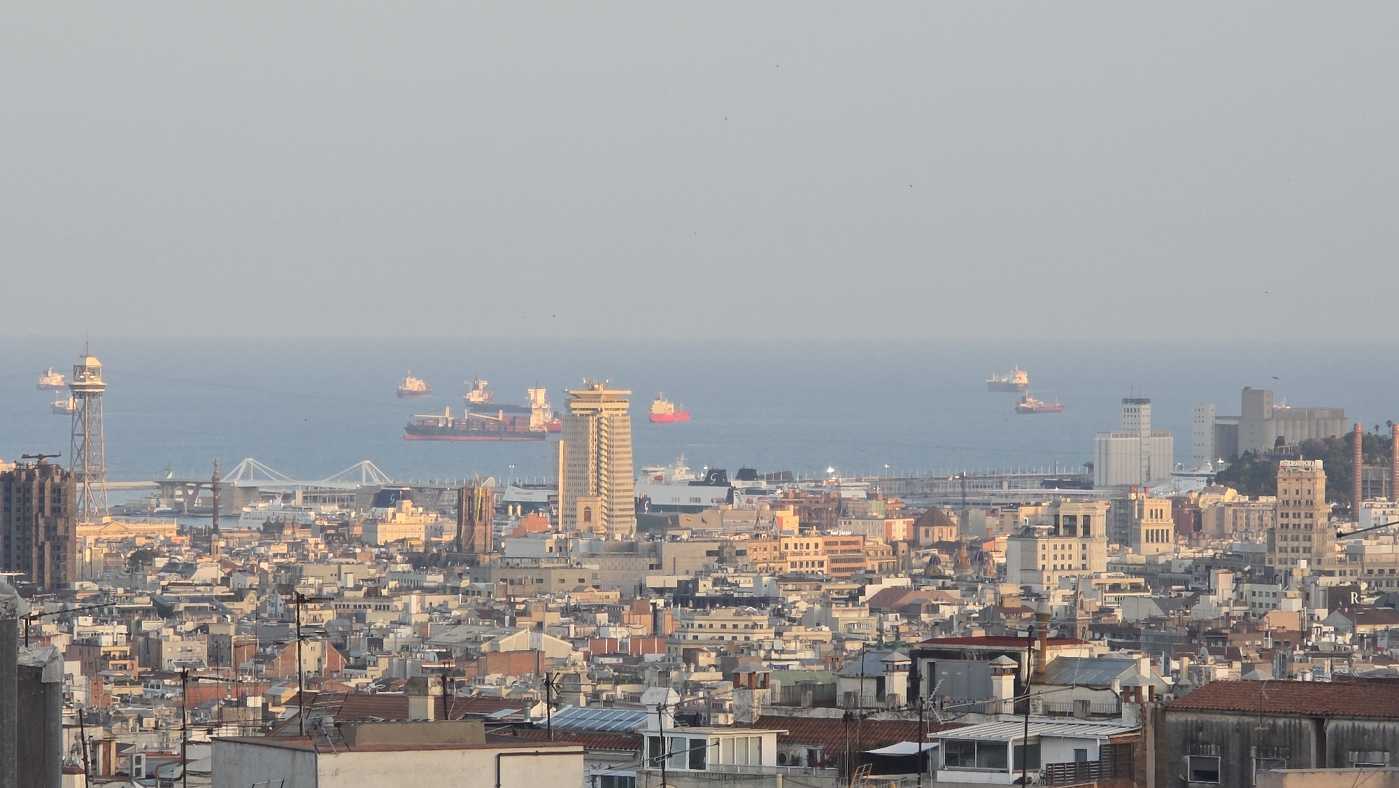 Sagrada Família spires rise over Barcelona's coastal skyline