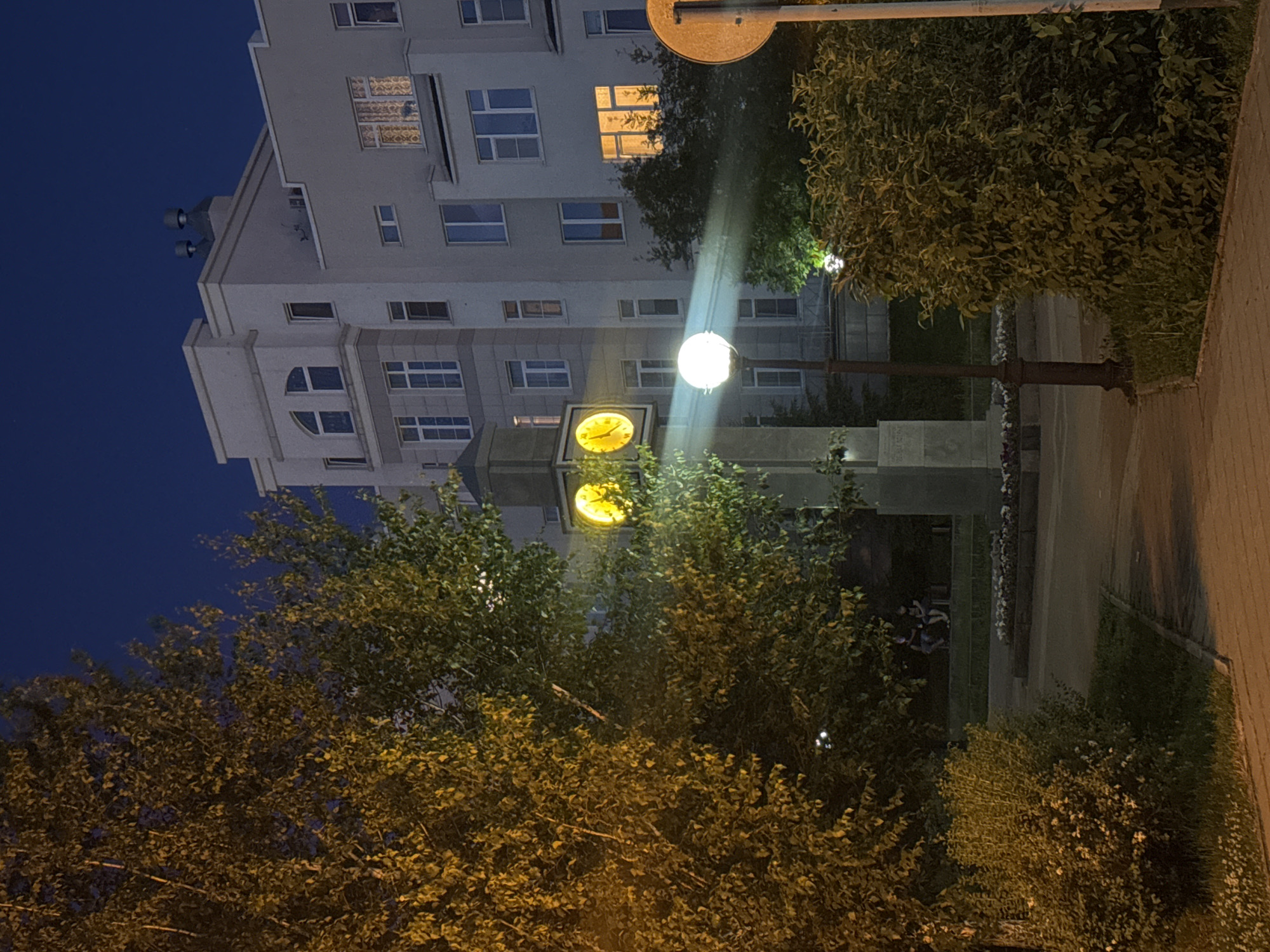 Kemerovo at nightfall: parks, neon, and city blocks