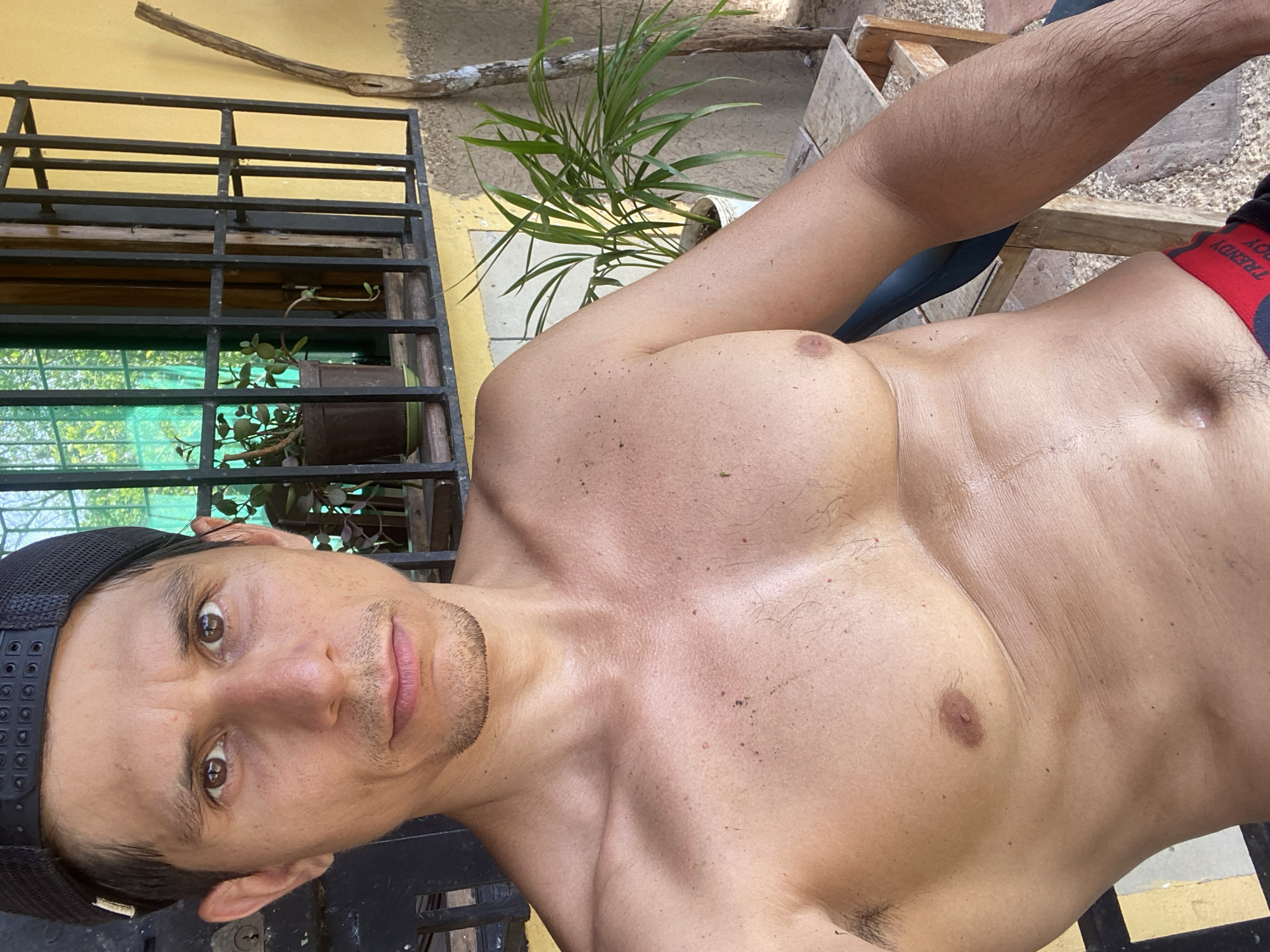 Man poses for photo in Venezuelan town, coffee request noted