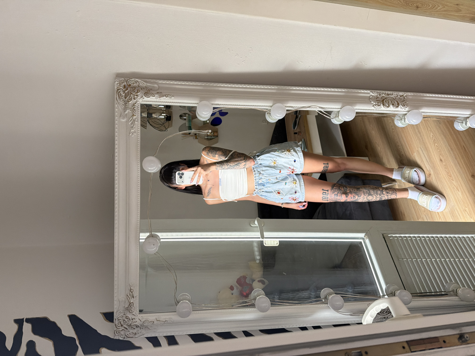 Mirror selfie session in Plovdiv, embellished denim and tattoos