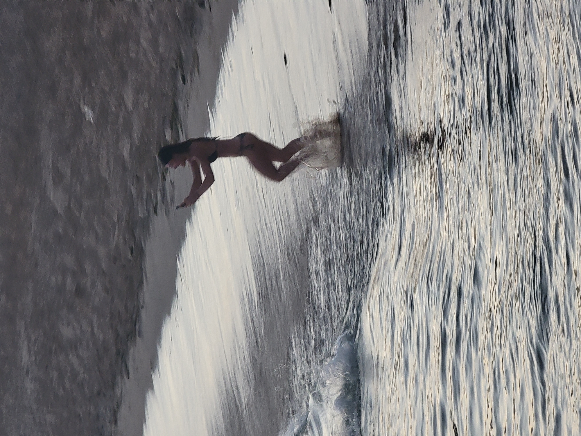 Evening swim and shoreline moments at Quarteira beach
