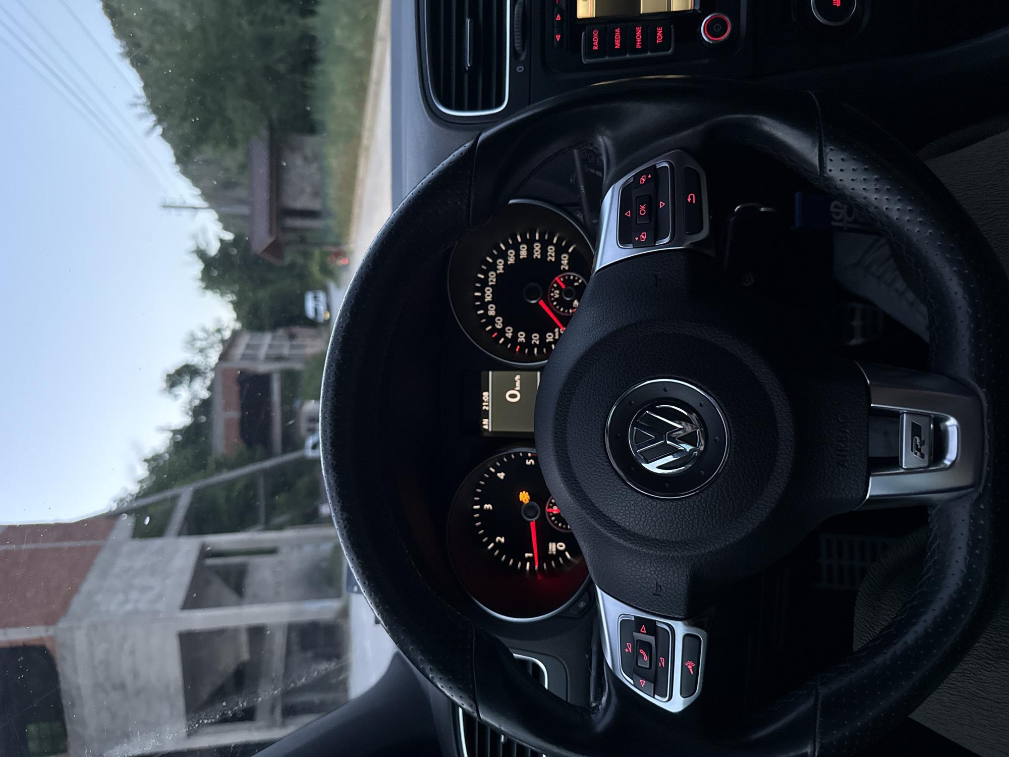 Modified car parked up in Krushev Dol at dusk