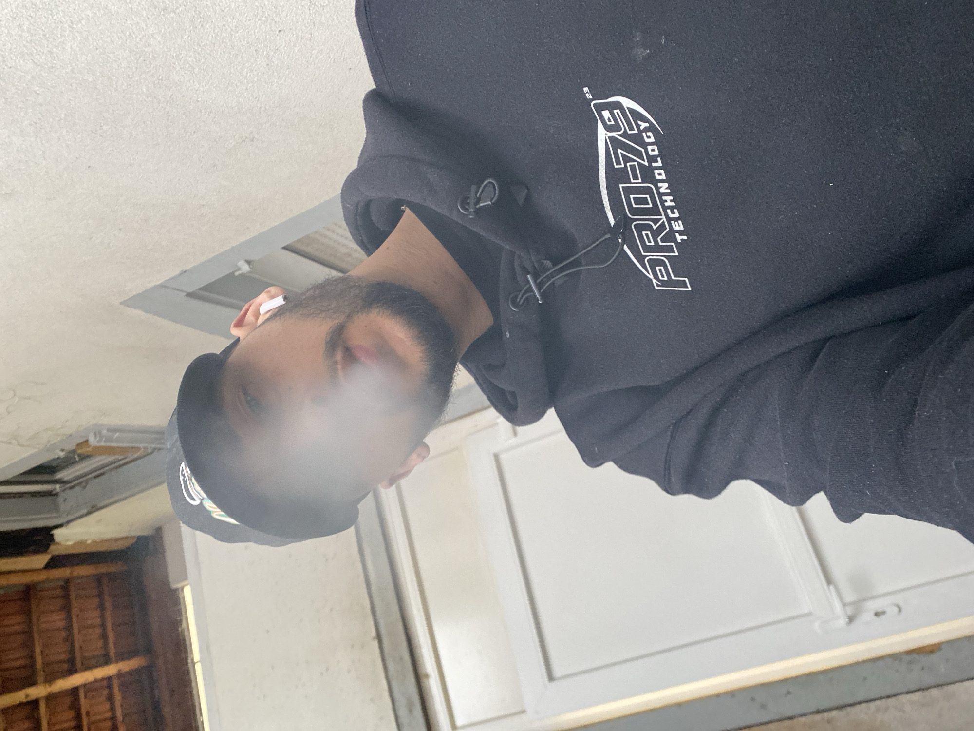Man in tech hoodie spotted smoking in Schiltigheim