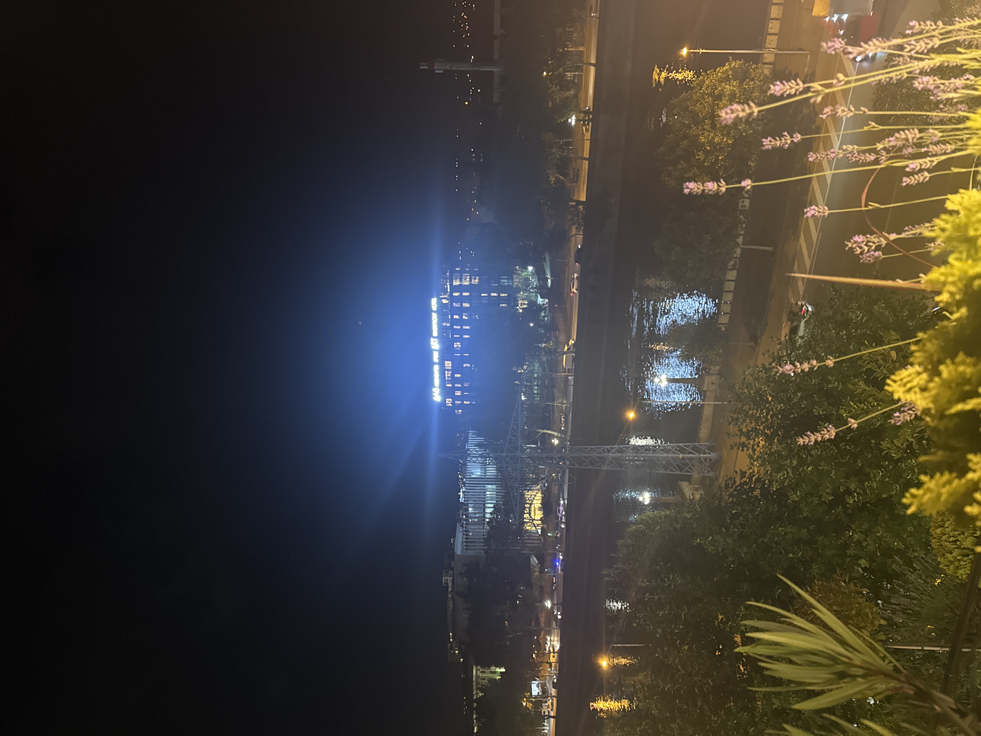 Tbilisi rooftop evening: city lights, river views, and dining