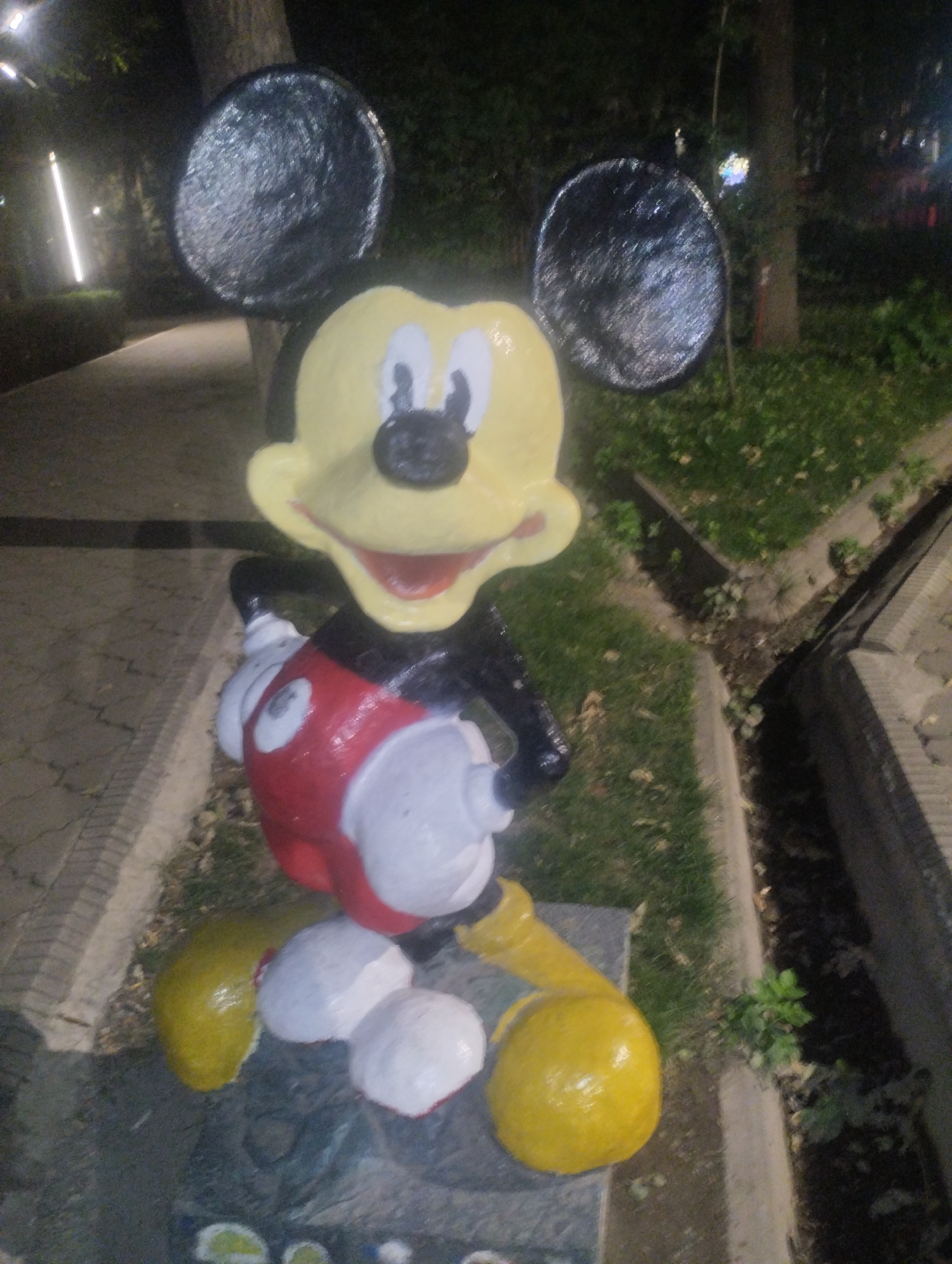 Bishkek amusement park at night, rides and lights in full swing