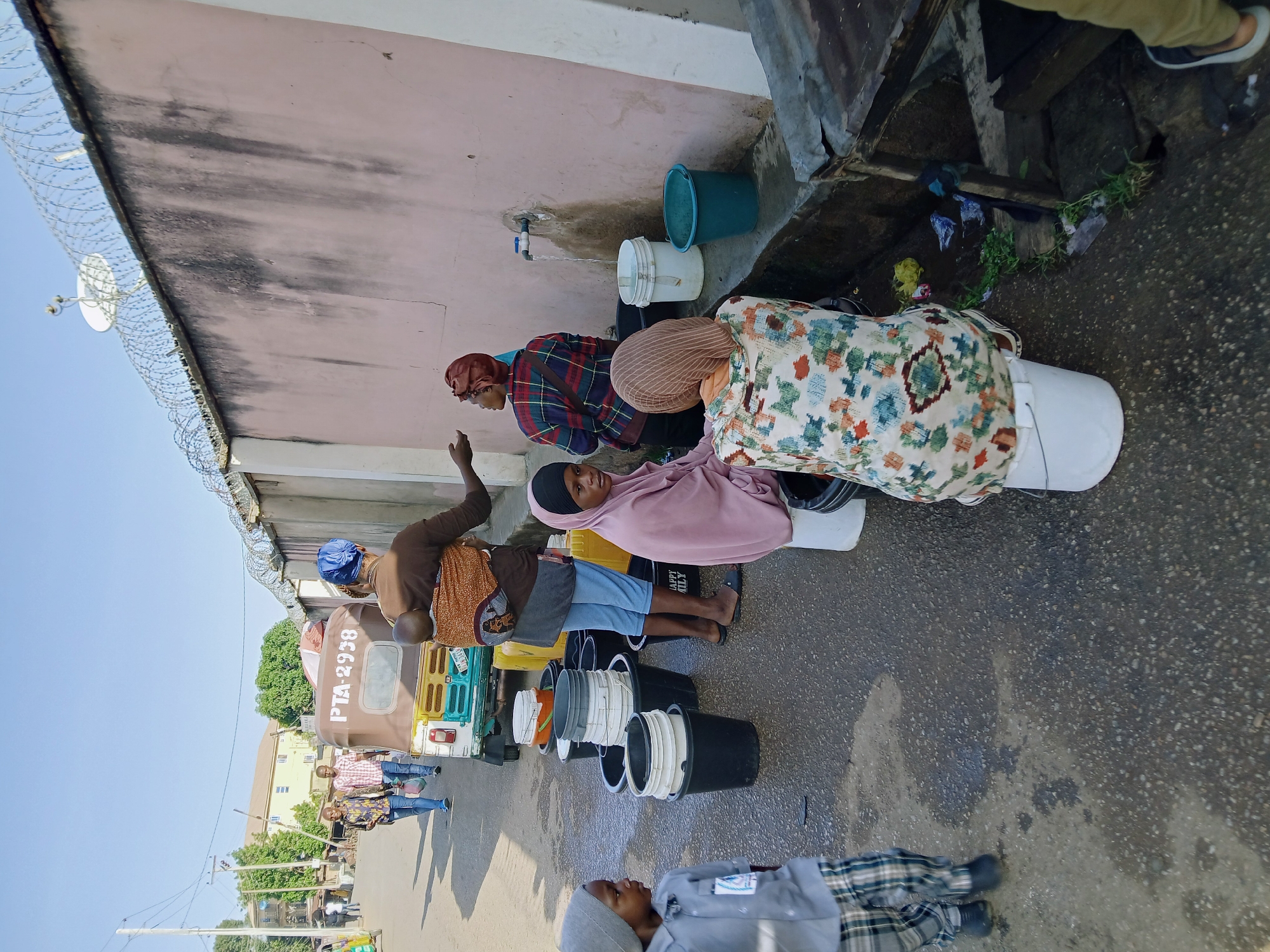 Morning community activities documented in unidentified urban area