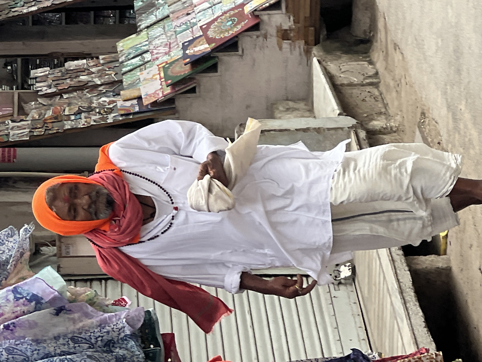 Street life and sacred presence in Pushkar's busy lanes