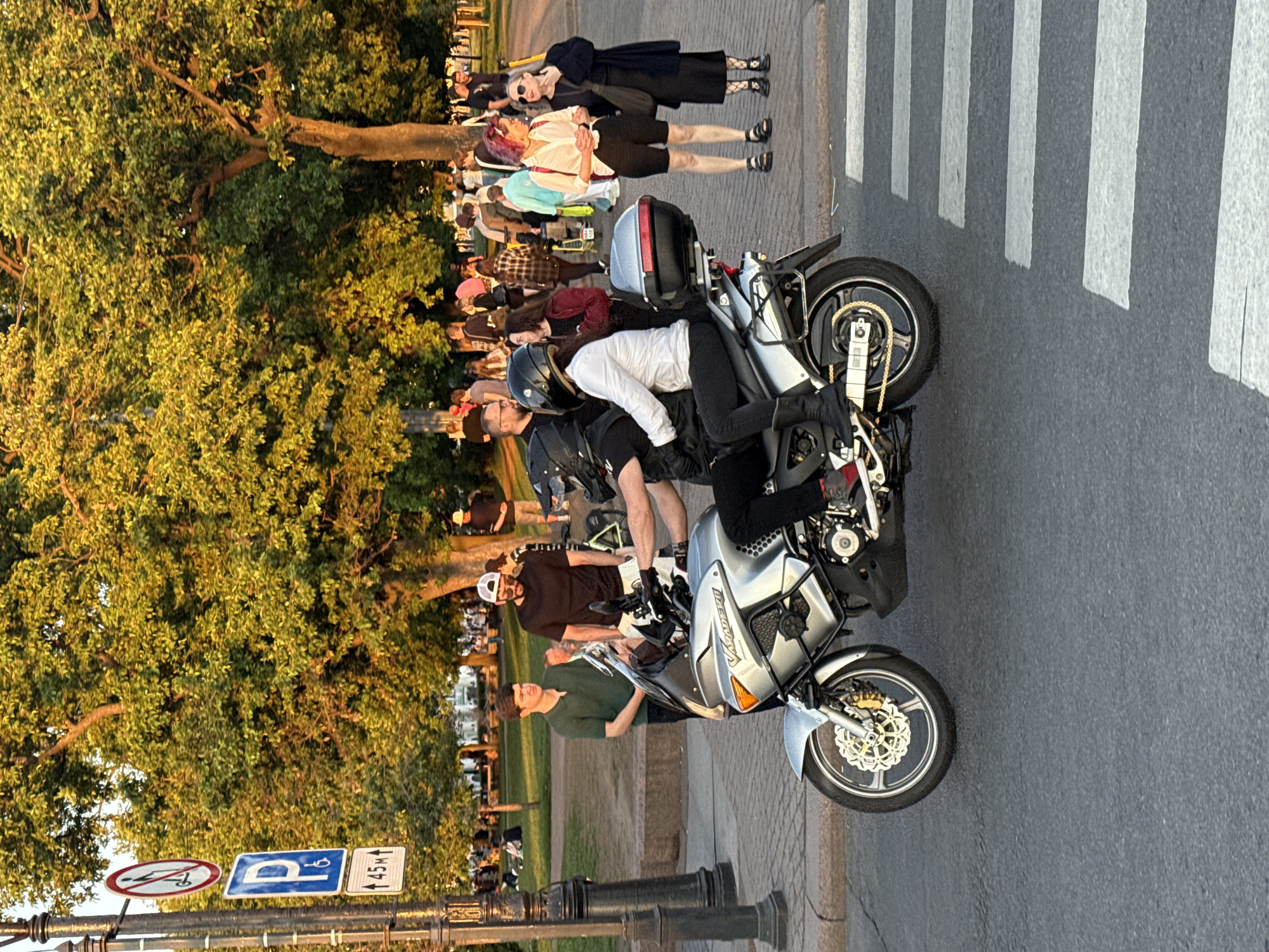 Golden hour scenes documented across Saint Petersburg including fire-breathing guitarist