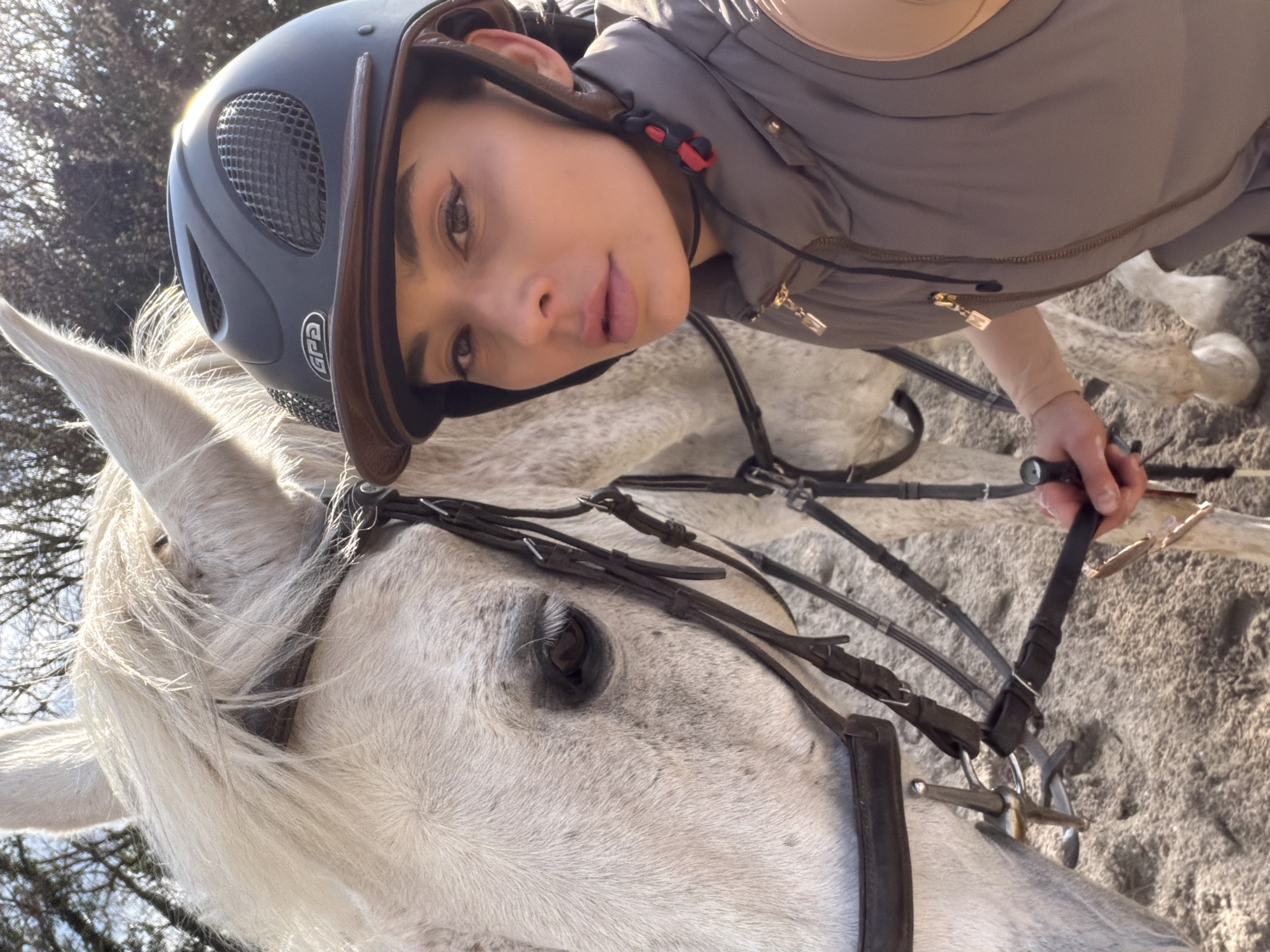 Equestrian takes playful selfies with white horse in Croatia