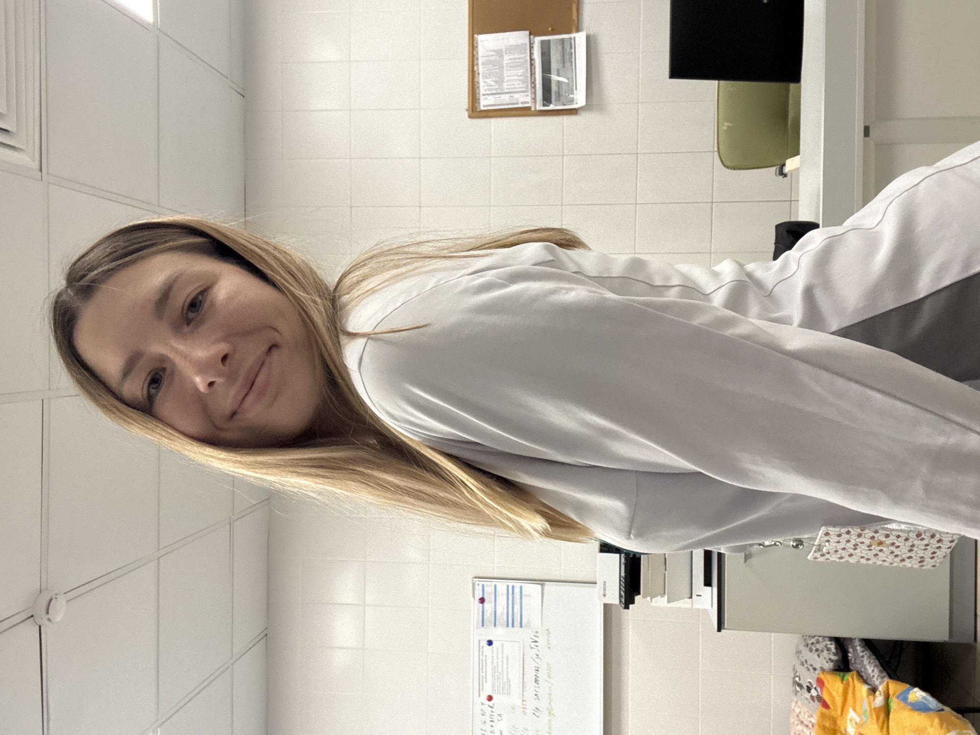 Clinic worker goofs around between shifts at Moscow medical lab