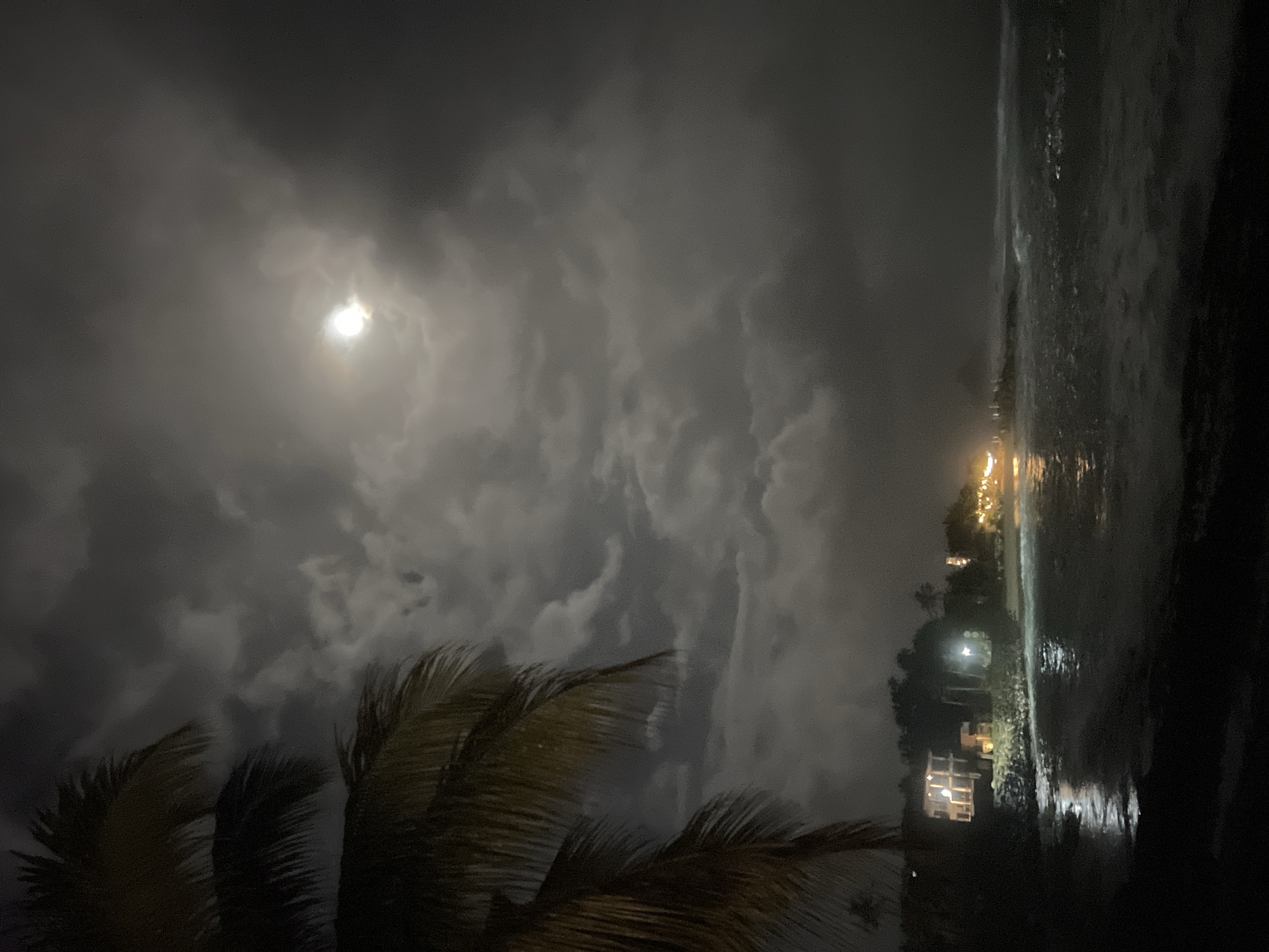 Full moon illuminates cloudy coastal night in Goviyapana, Sri Lanka
