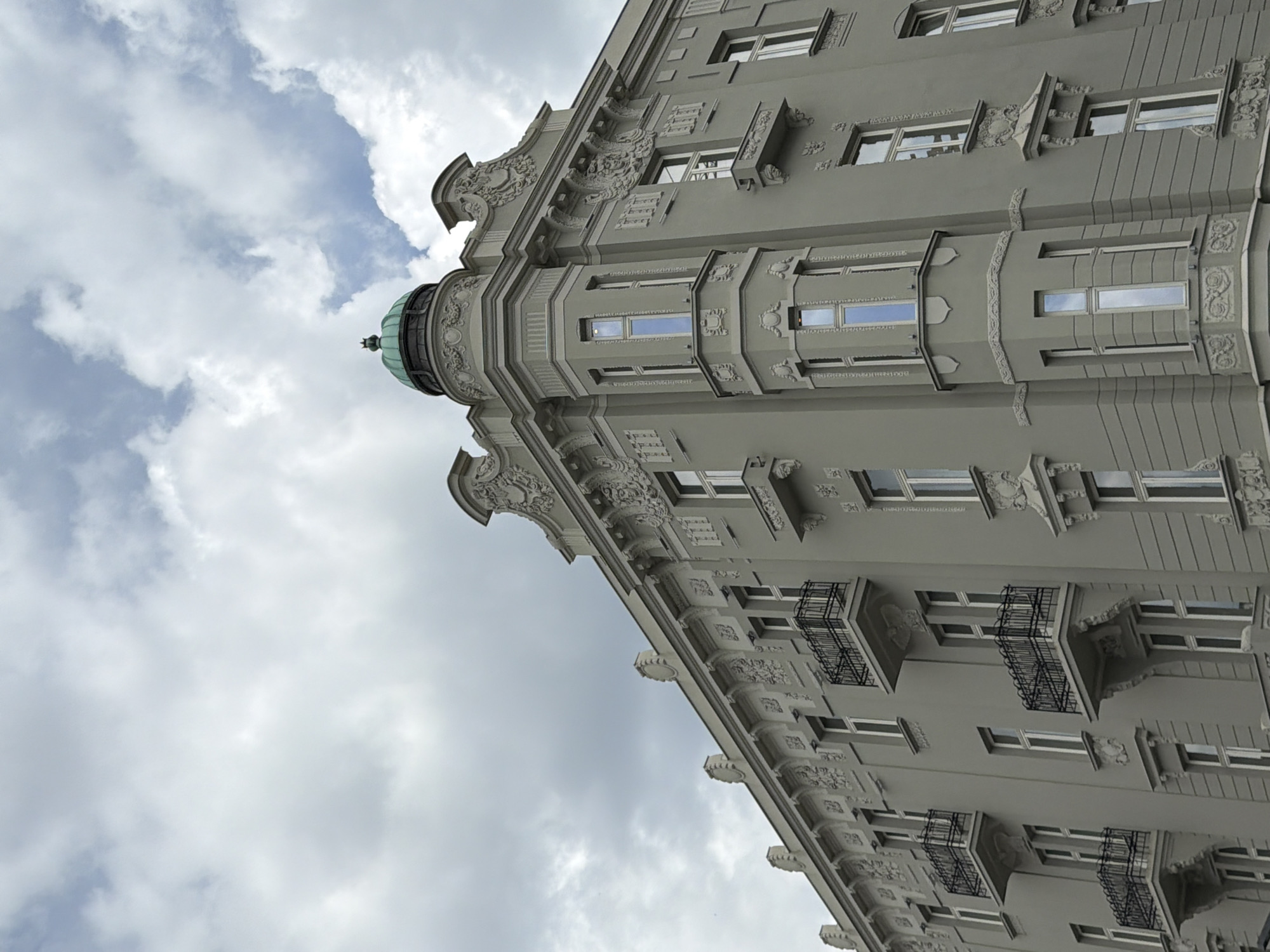Witness documents Belgrade architecture and street life during midday walk