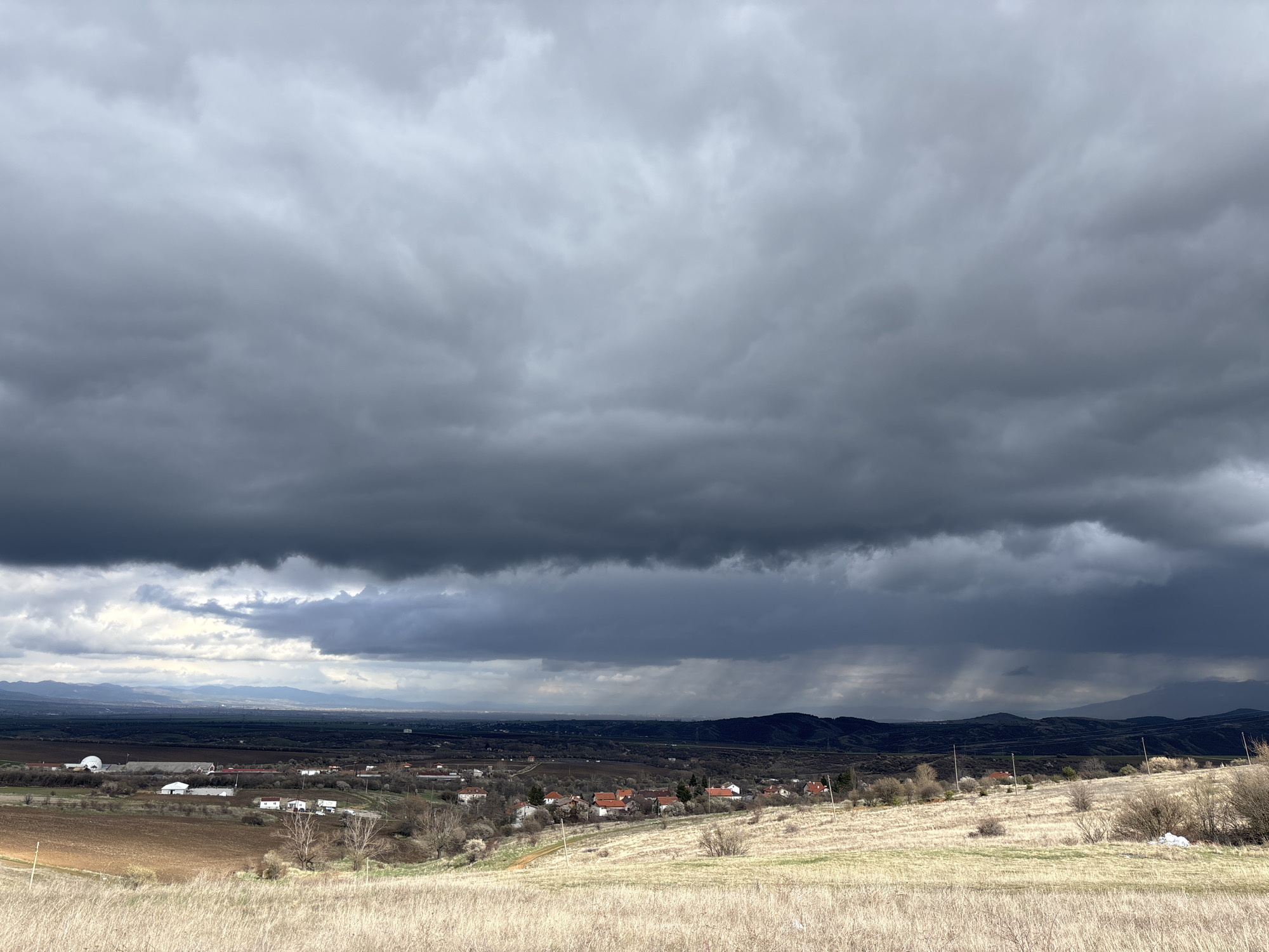 Storm clouds gather over Hrabarsko, Bulgaria countryside