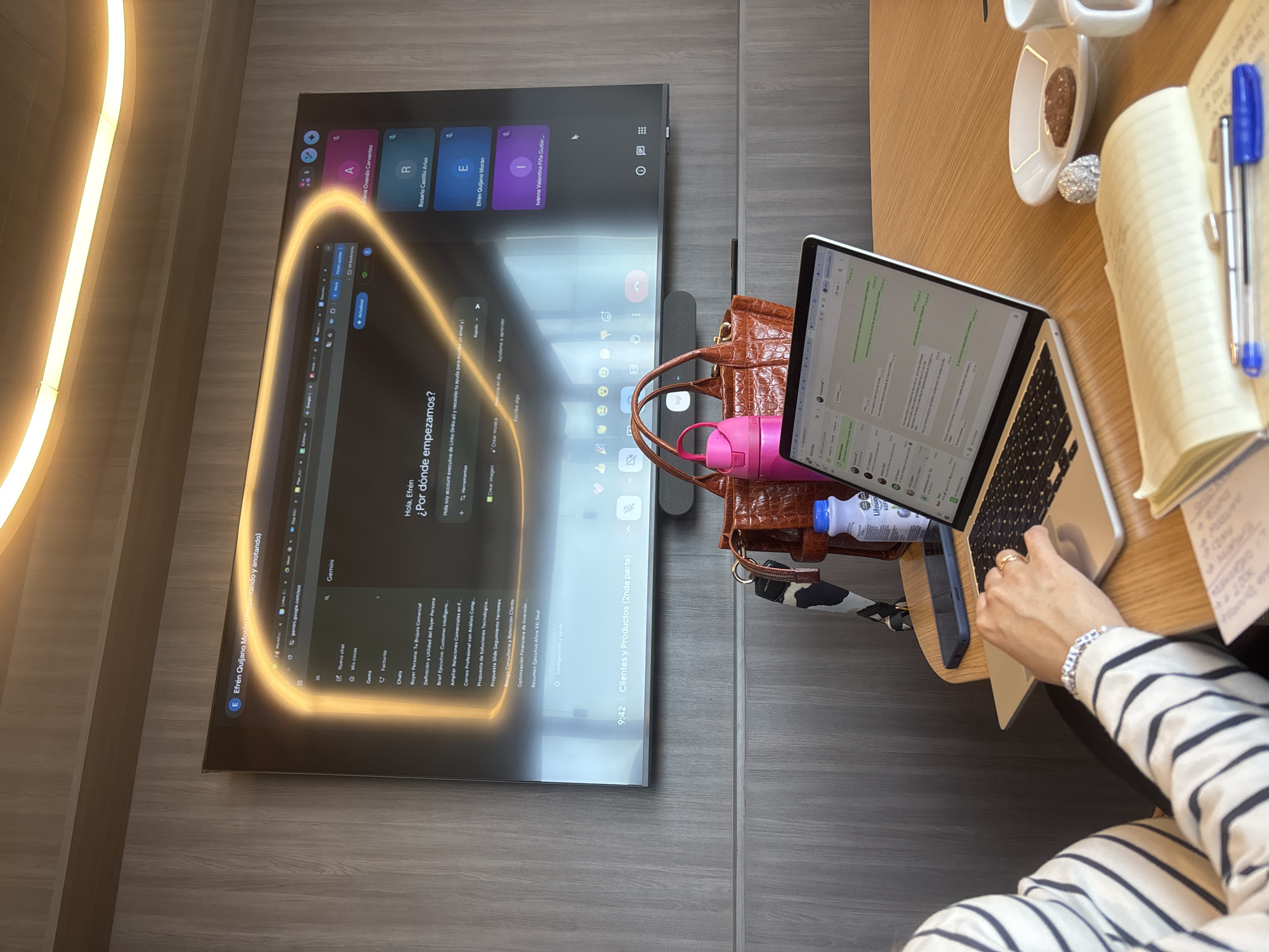 Person working at desk in office workspace