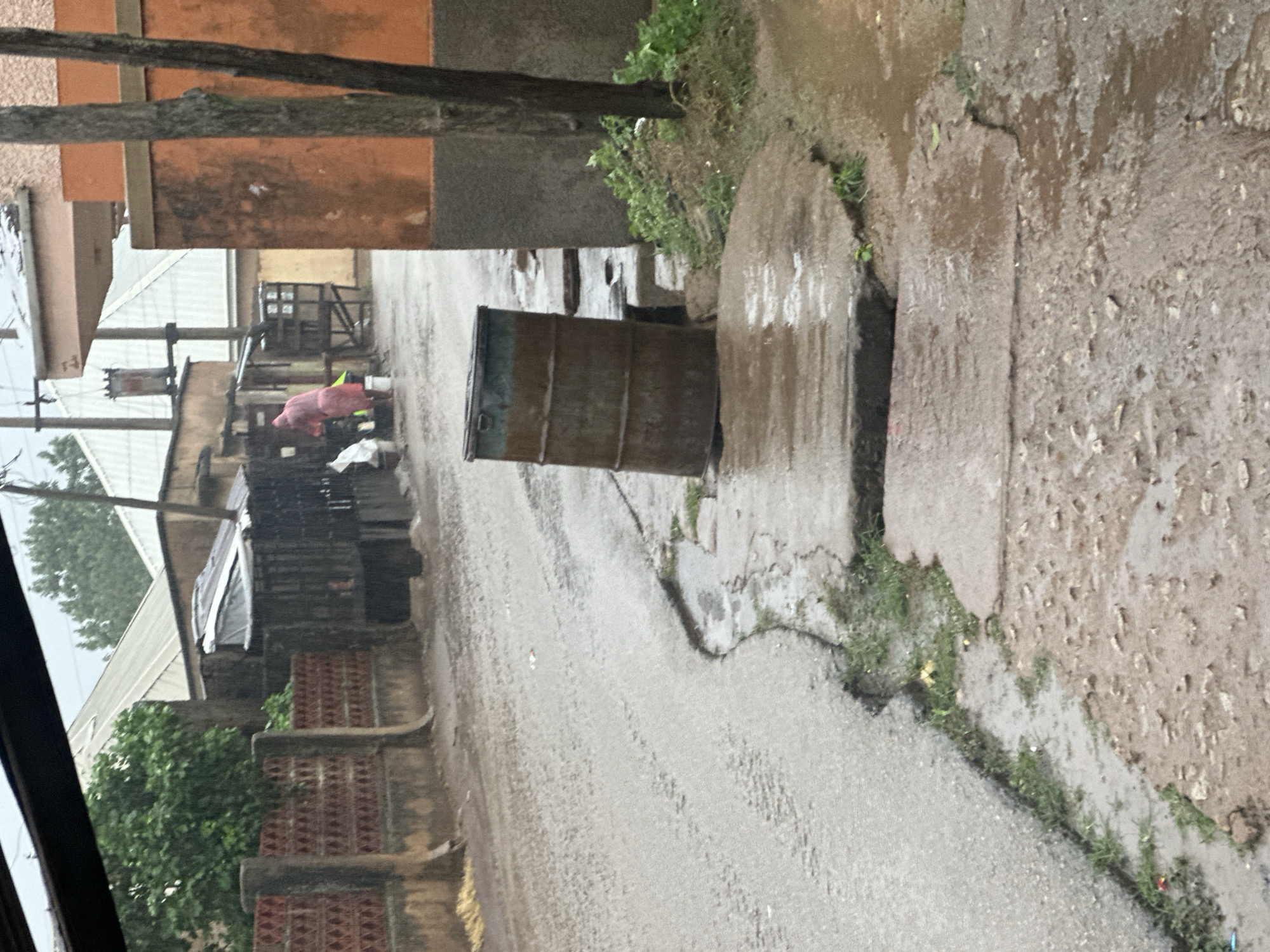 Rainy day life captured in developing urban neighborhood