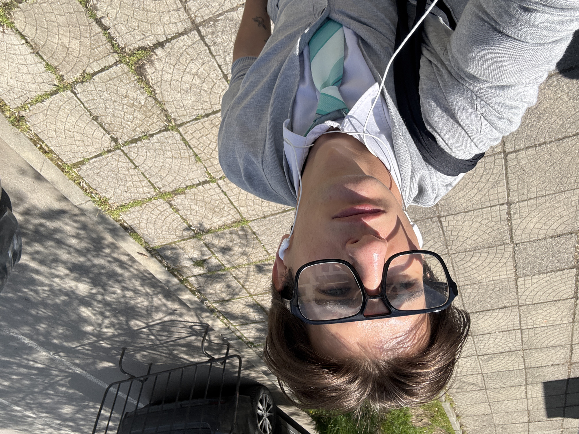 Person photographed from multiple angles in Sofia street session