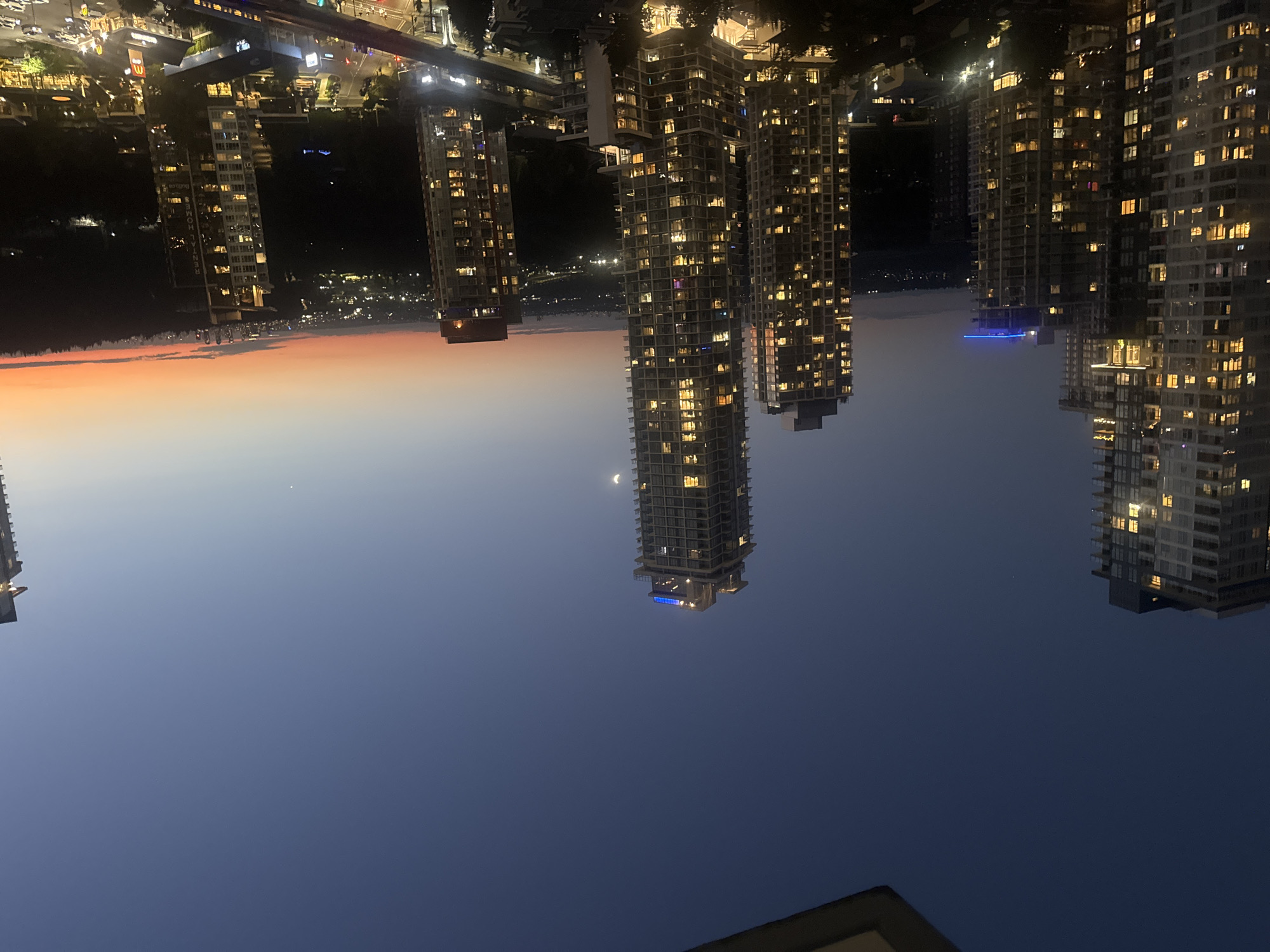 Coquitlam high-rises glow at twilight from above