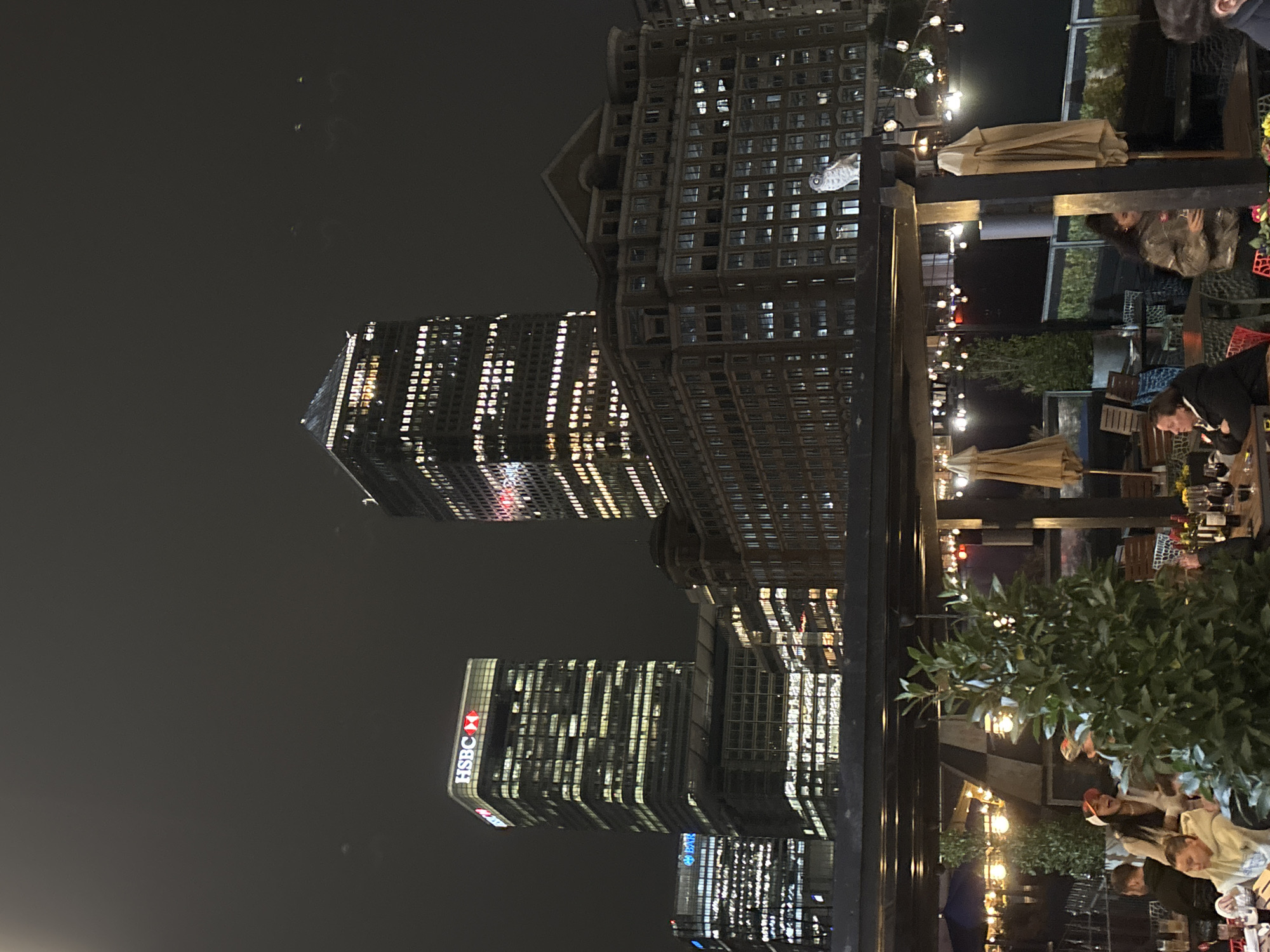 London Canary Wharf skyscrapers illuminated at night