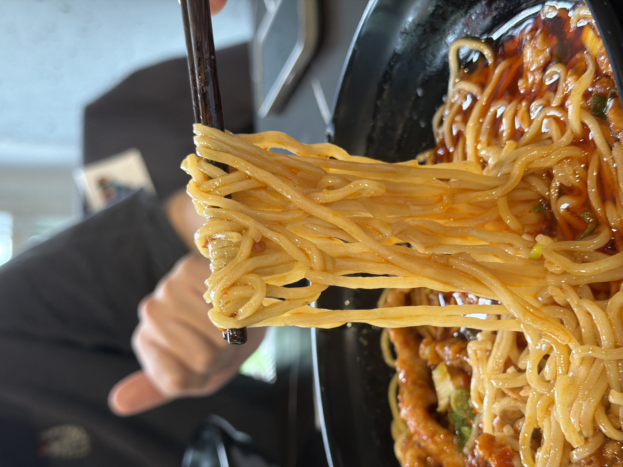 Diner documents Asian restaurant meal in Saint Petersburg