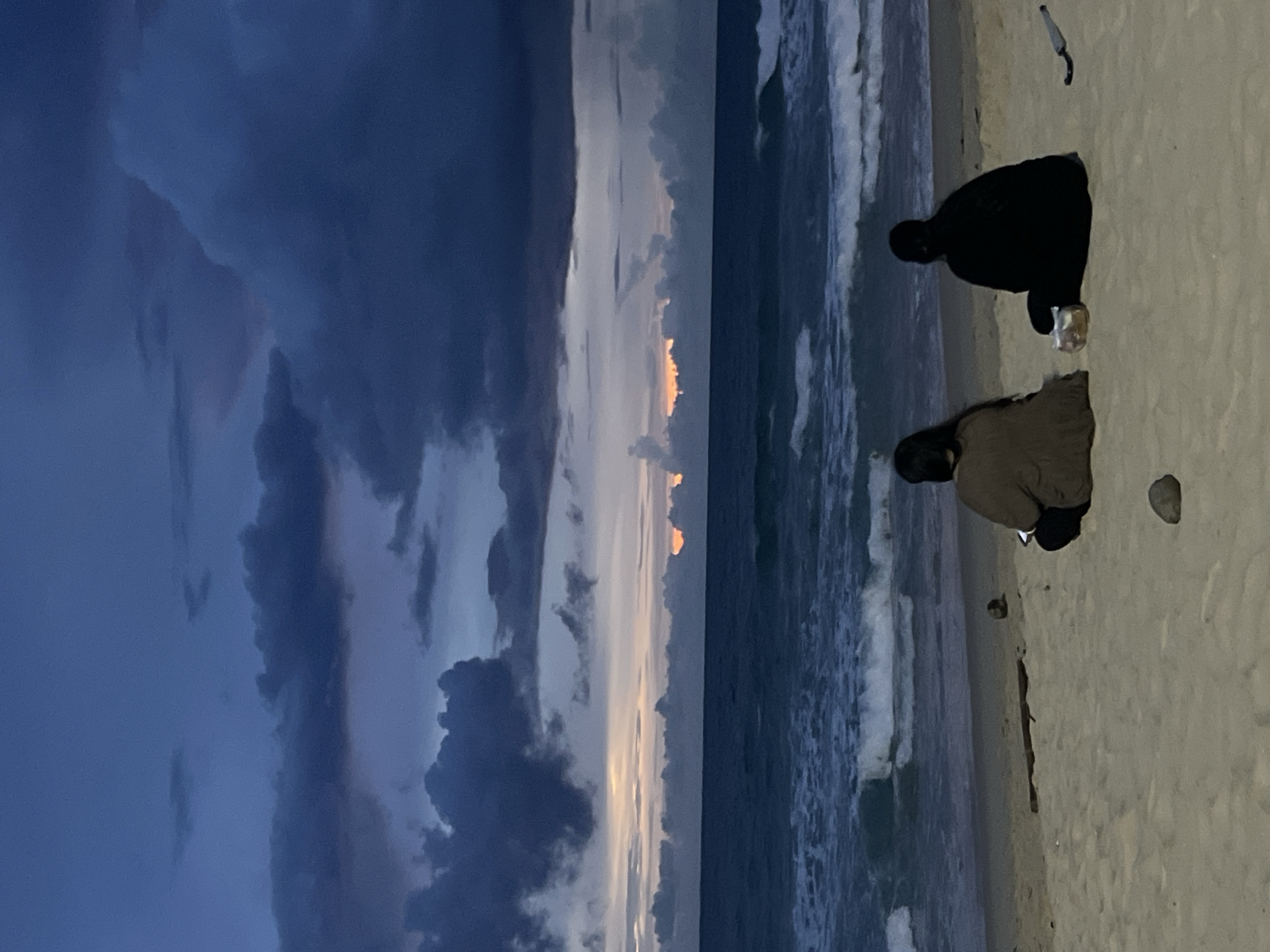 Stormy dusk on a Choeng Thale beach, fishing and lingering