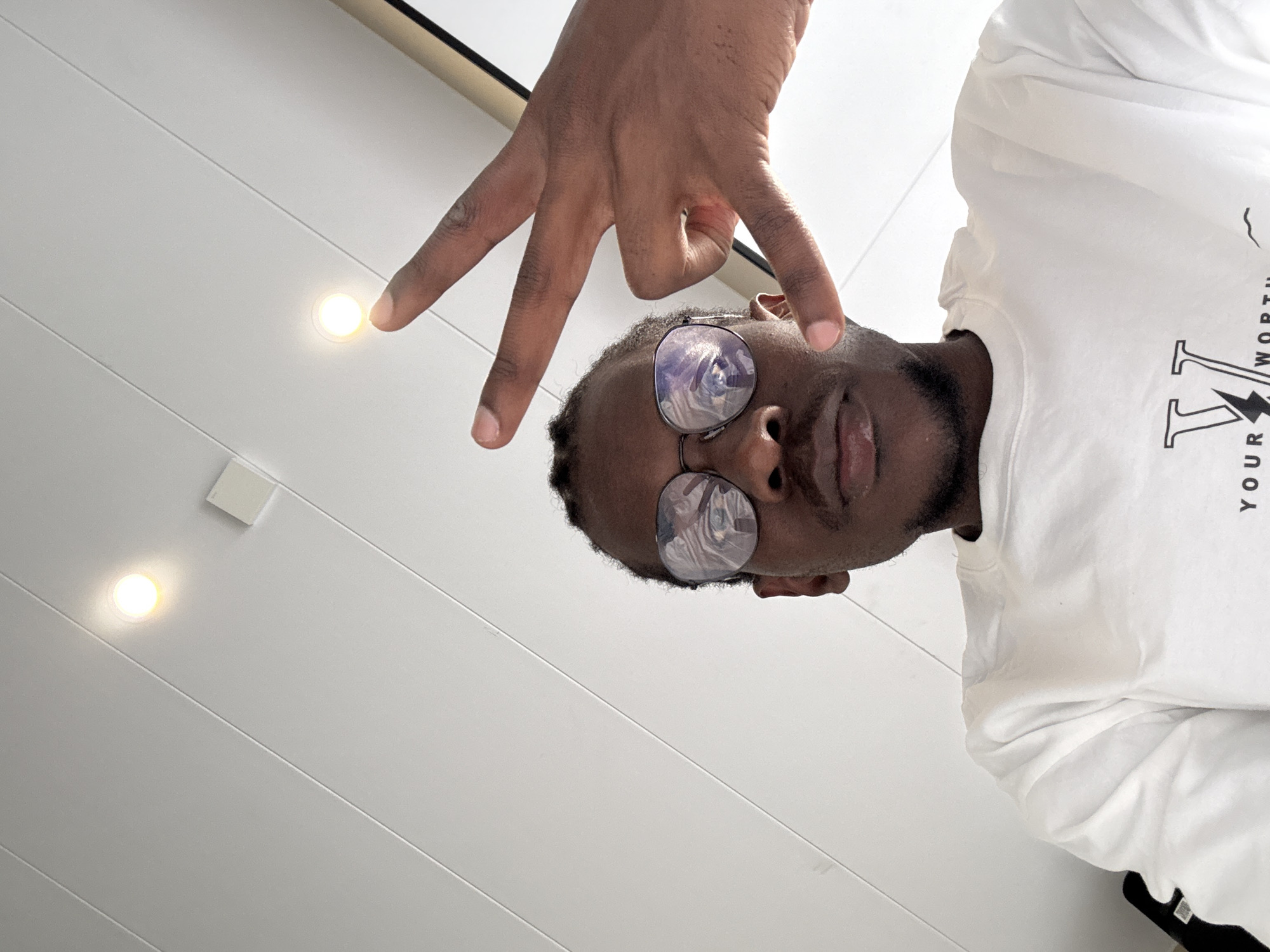 Selfie session in Yuzhong District, round glasses and white tee