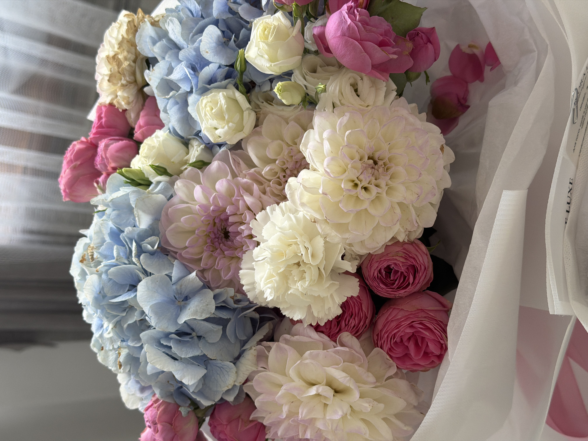 Pastel flower bouquet photographed from multiple angles in Khmelnytskyi