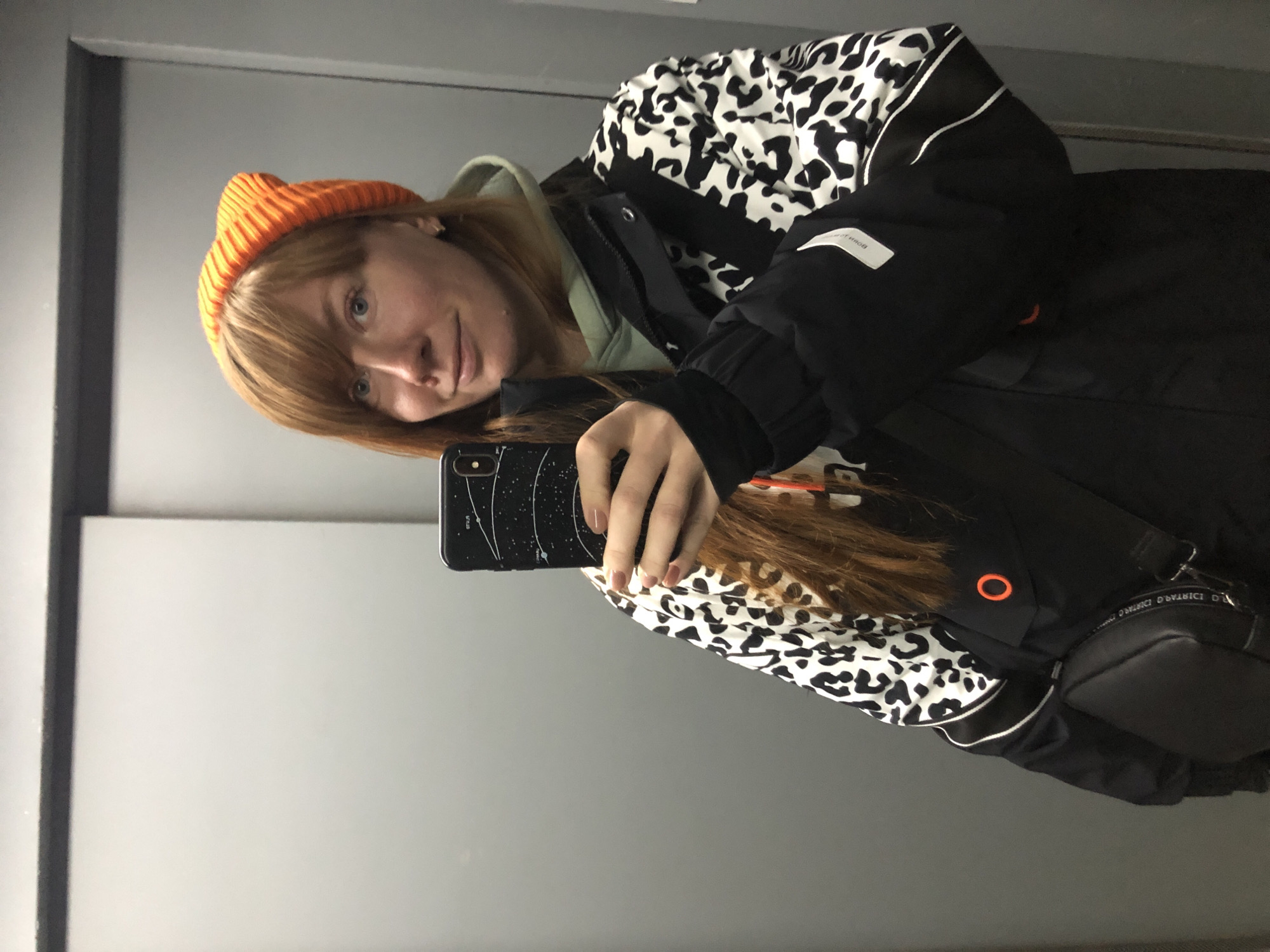 Woman Takes Mirror Selfie in Krasnoyarsk