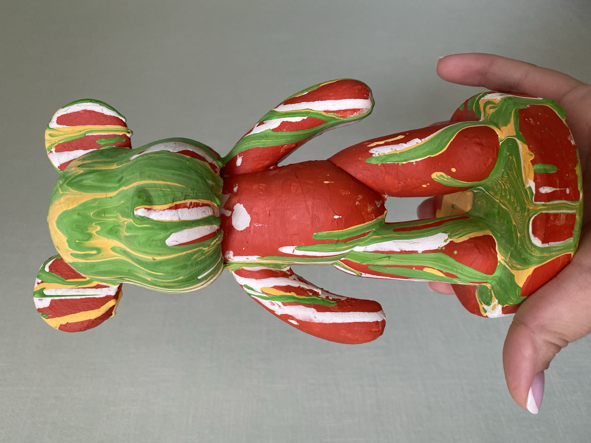 Painted toy bear documented with wooden blocks in Sochi