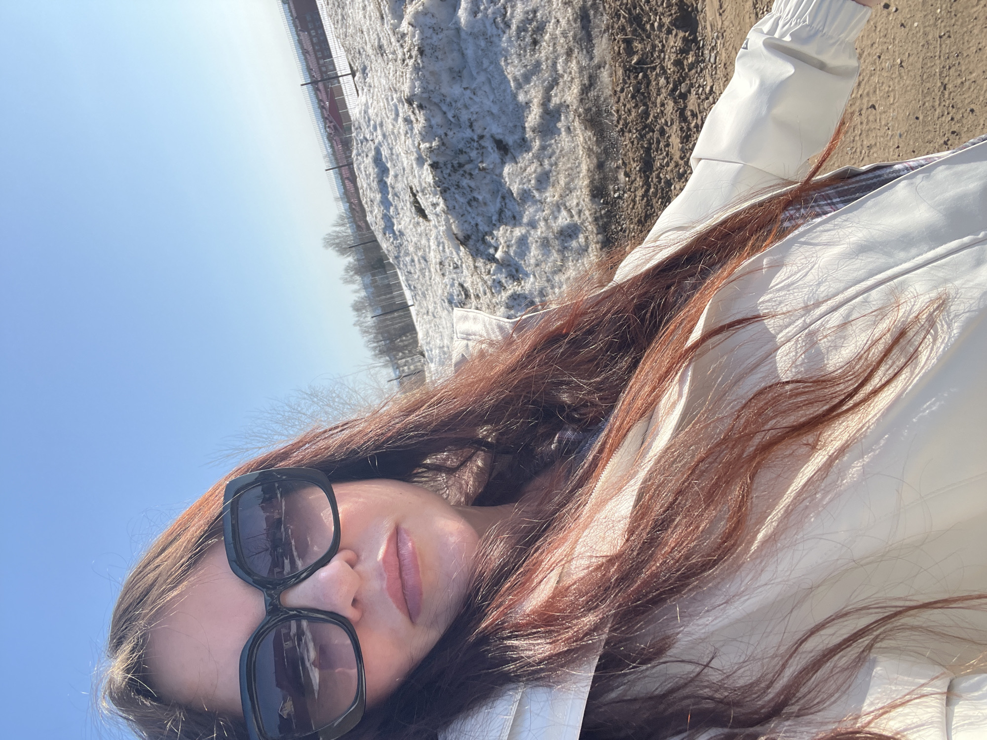 Woman and child enjoy sunny spring outing in Noviy
