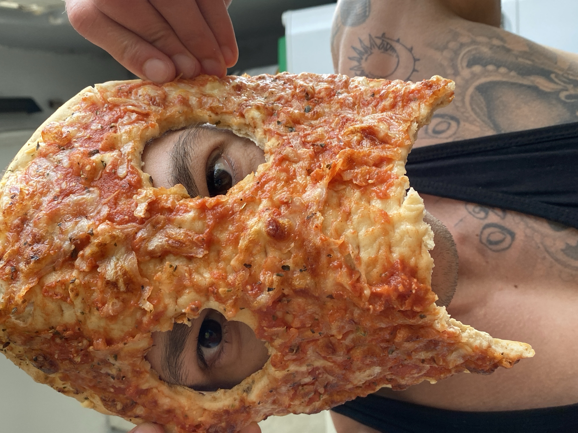 Person uses pizza slice as face mask in Bulgaria
