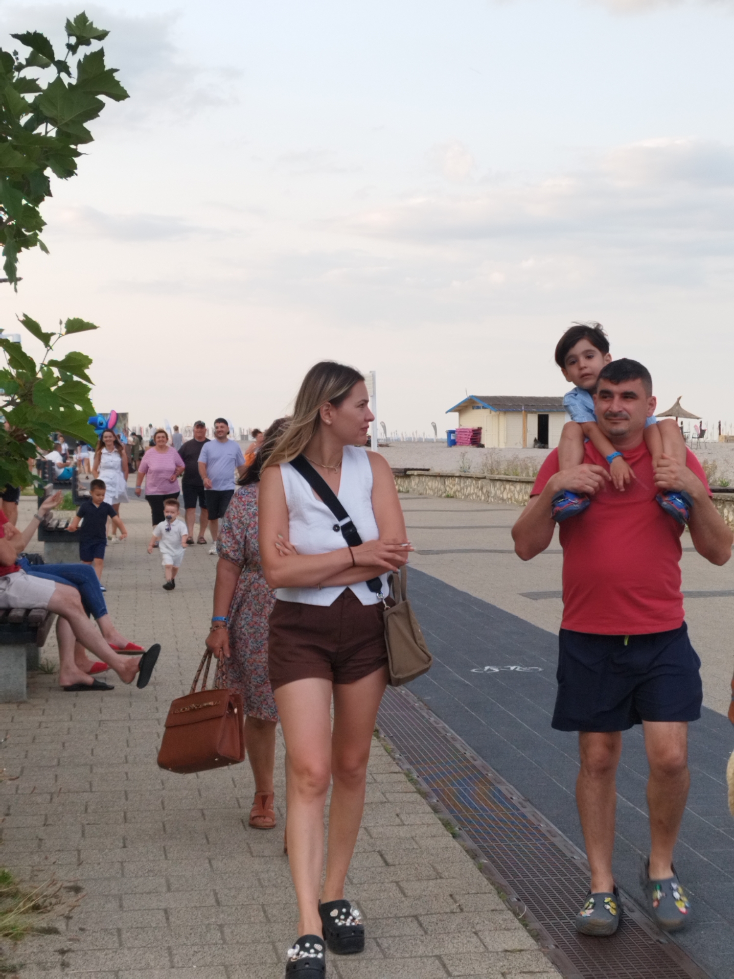 Sunset strolls and stormy skies at Constanța's beachside park