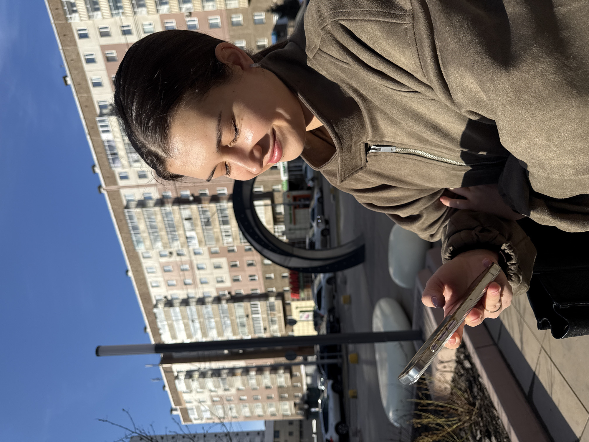 Woman photographed in urban Krasnoyarsk setting