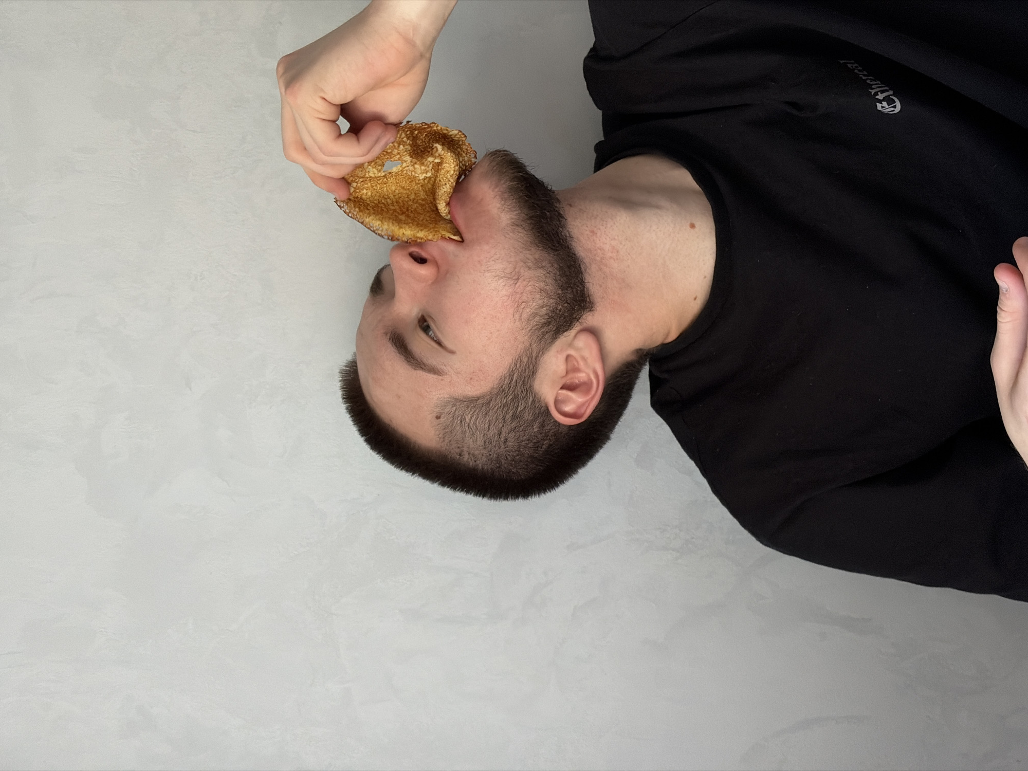 Man enjoys pancake breakfast in Sarapul, Russia