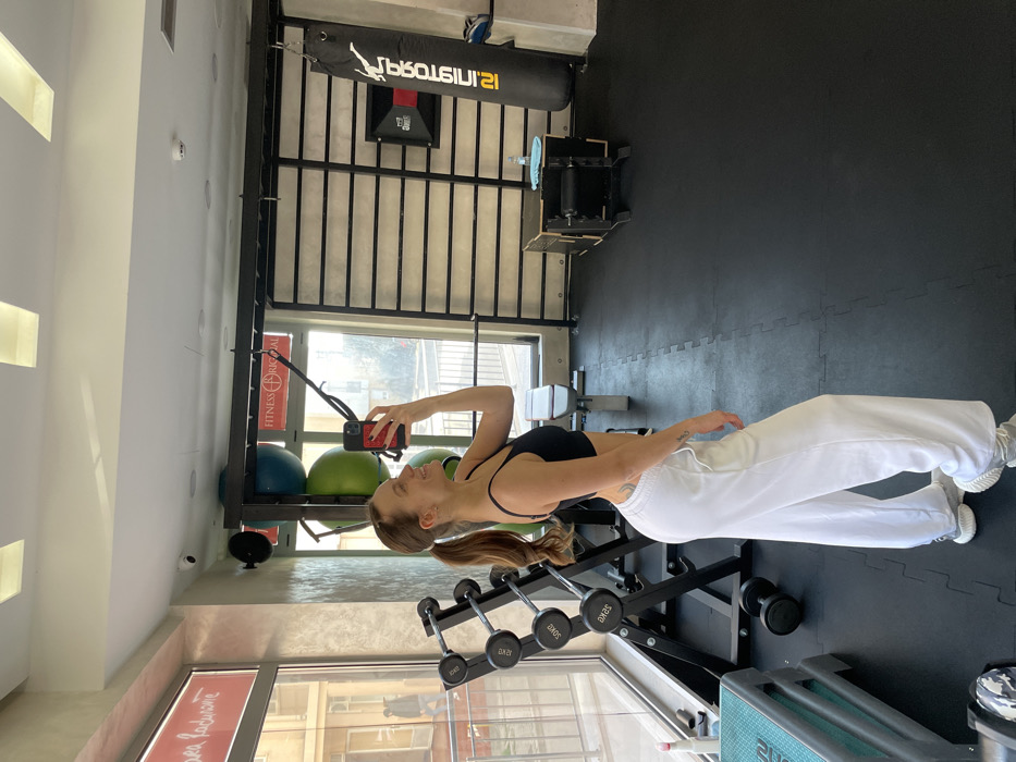 Woman documents morning workout session at Budva gym