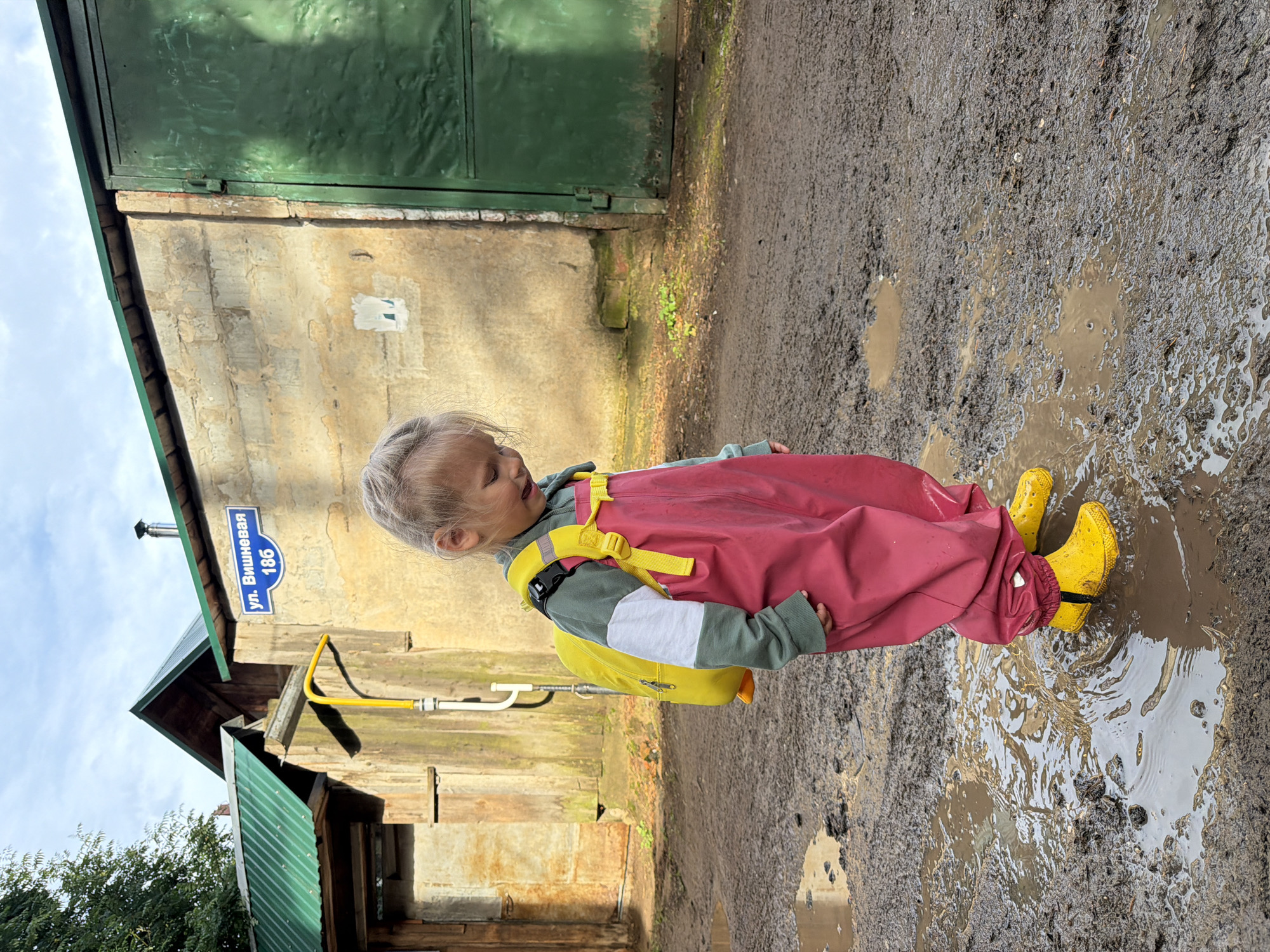 Muddy puddles and park paths on a summer afternoon in Chaikovsky