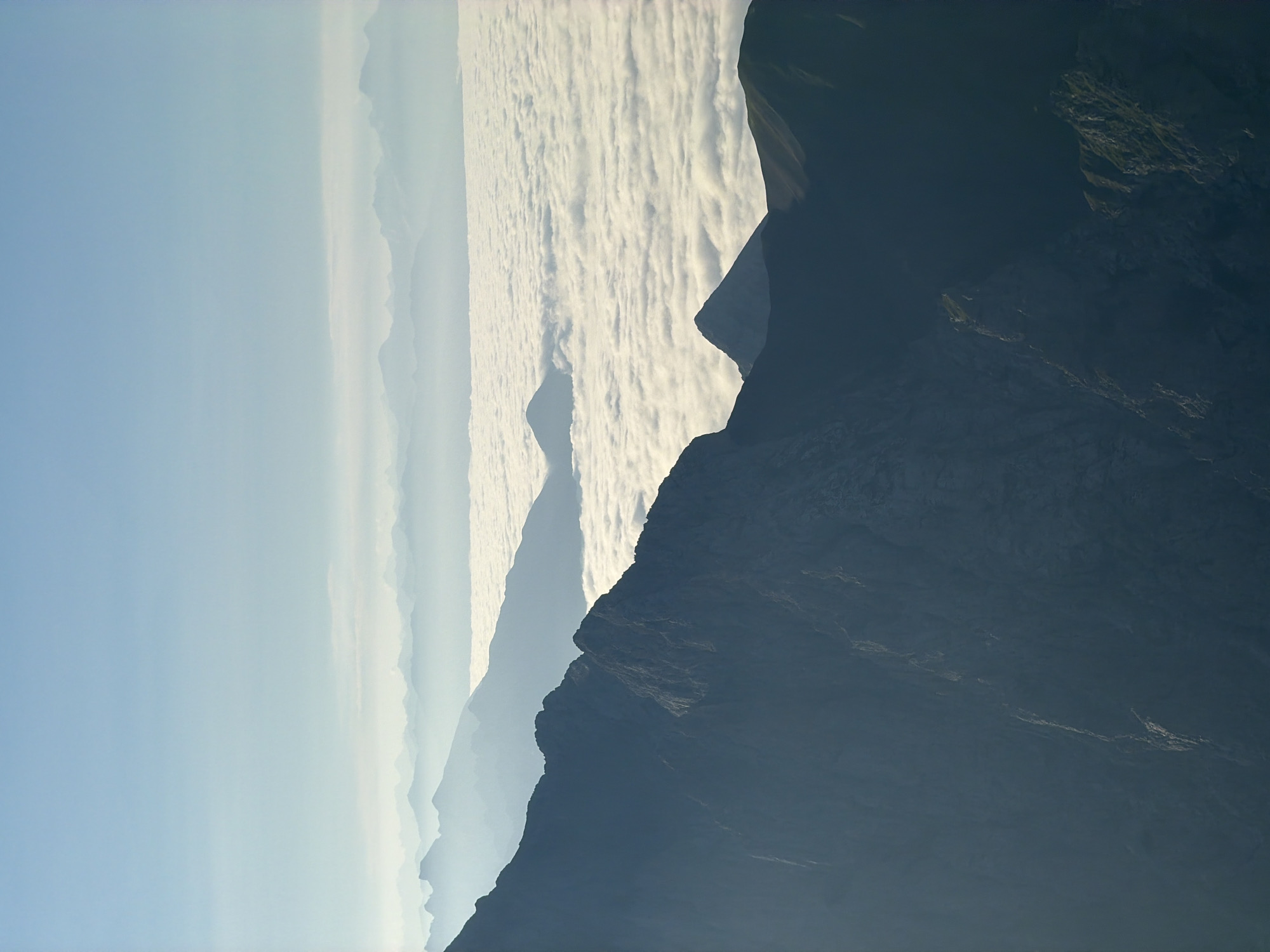 Above the clouds in the Bavarian Alps, peaks breaking through