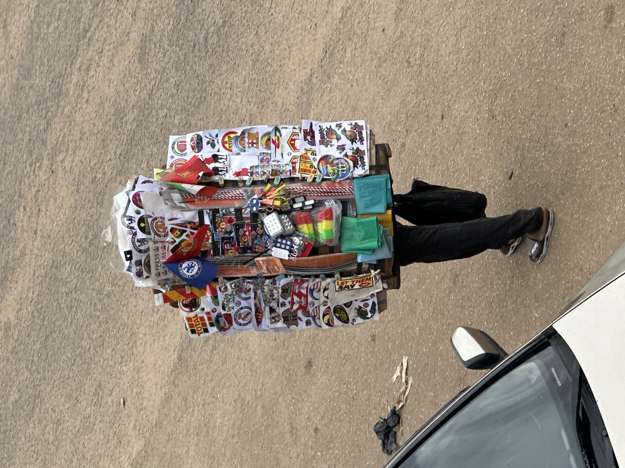 Daily street commerce unfolds in Bukuru, Nigeria marketplace