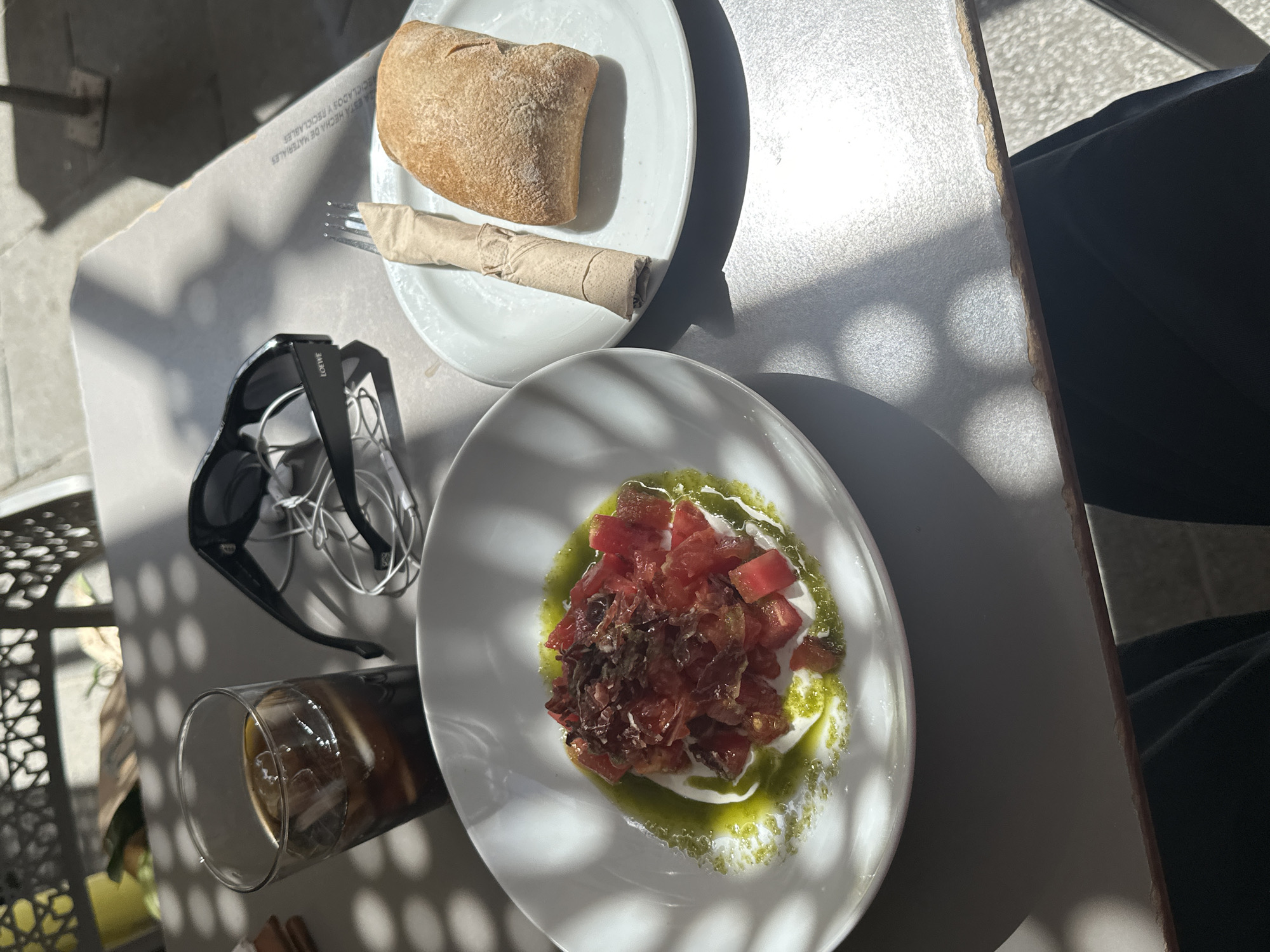 Outdoor lunch and architecture documented in Madrid afternoon