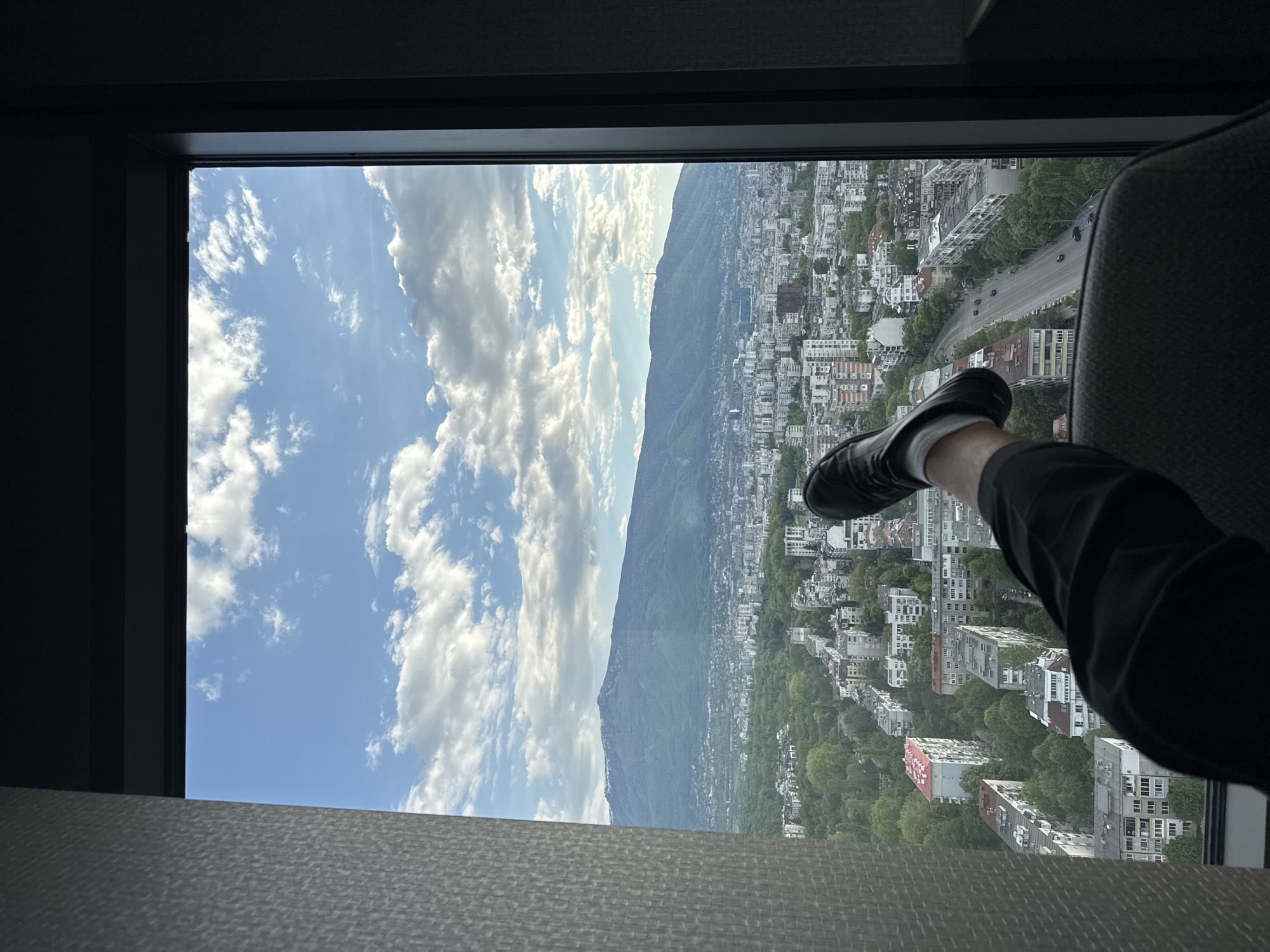 Window views of Sofia skyline captured from high-rise building