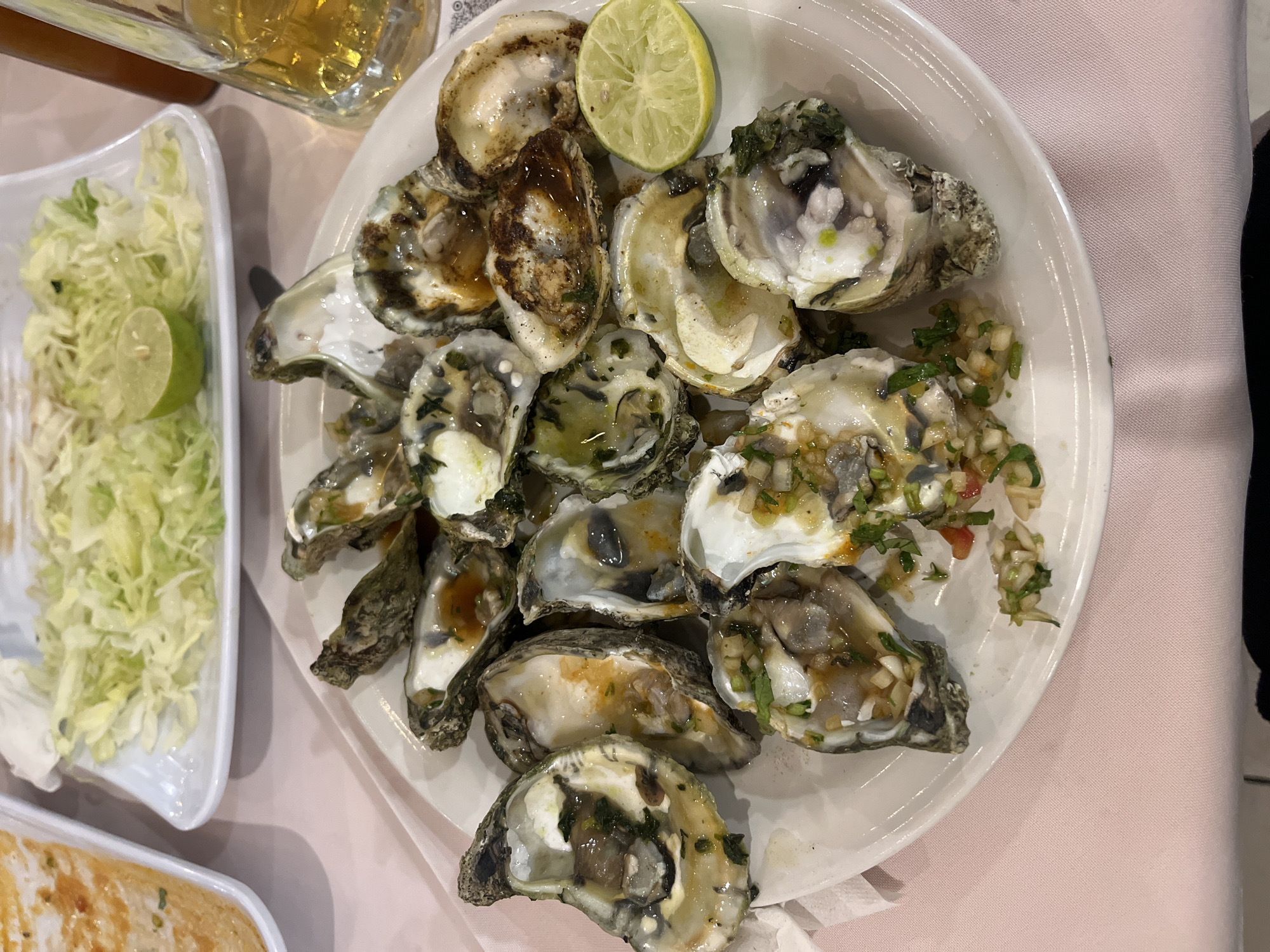Diner enjoys oysters and Corona at Mexican restaurant