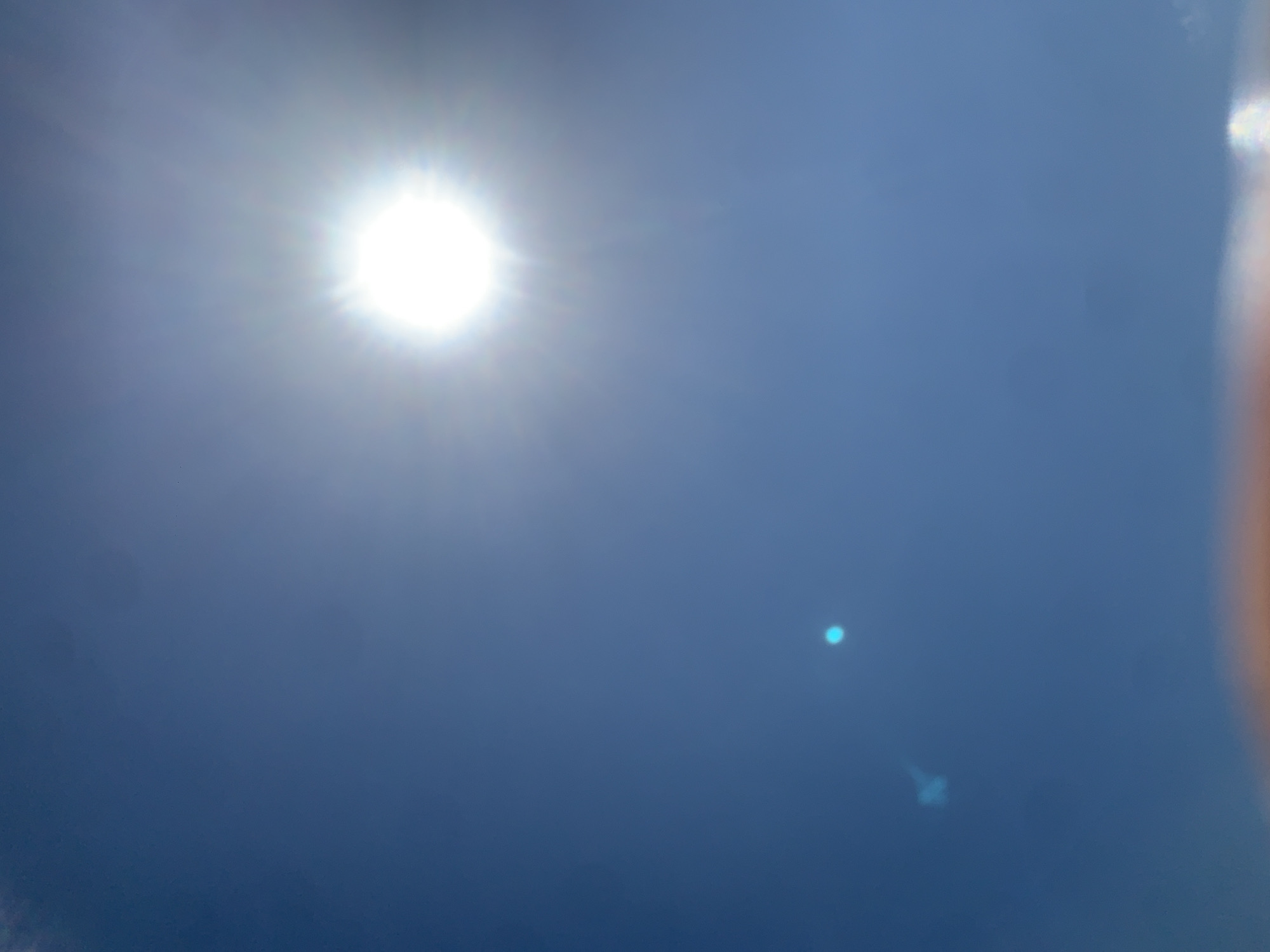 Direct sun shots over Khazar Raion on a clear July morning