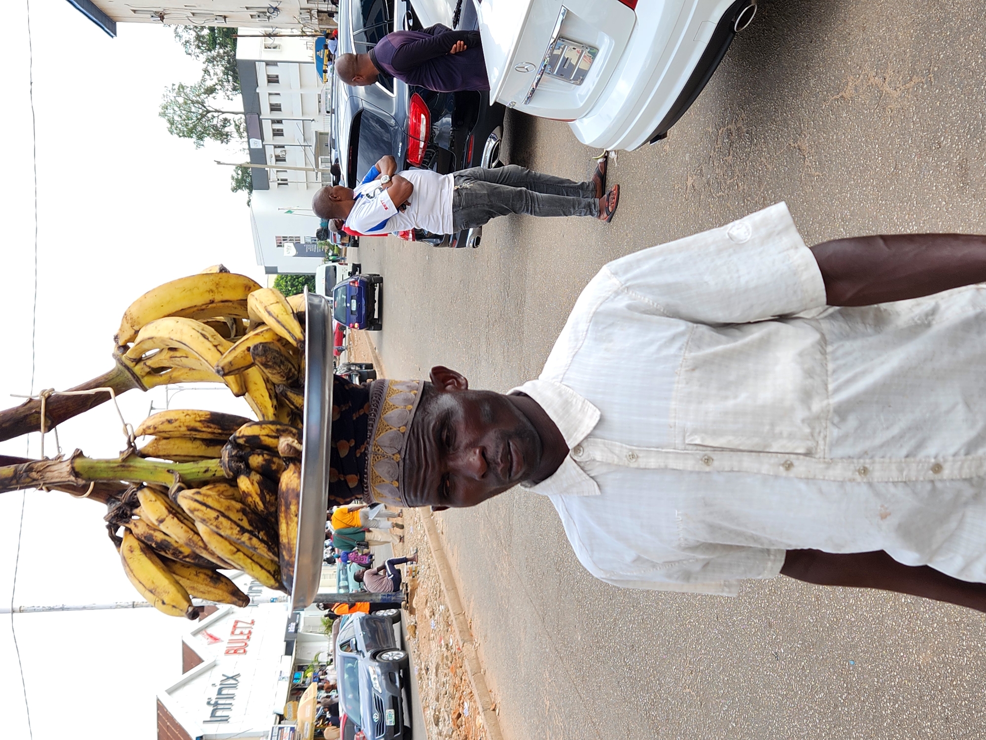 Street vendors and pedestrians observed during afternoon hours