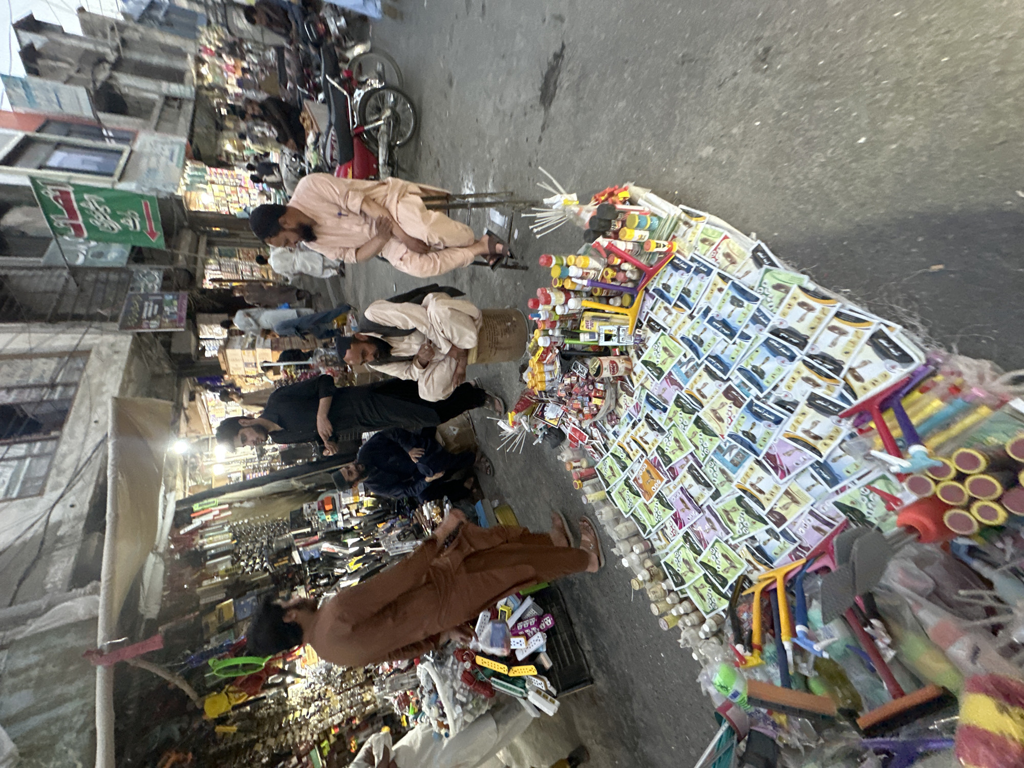 Street vendors operate market stalls in Quetta City