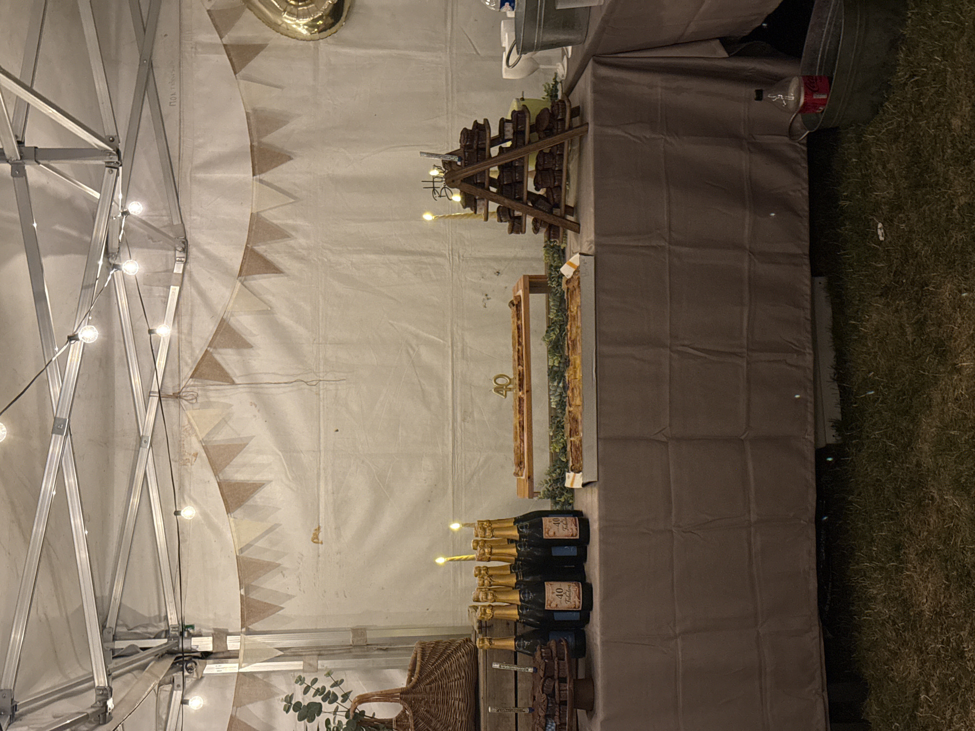 Outdoor 40th birthday celebration under a tent in Savigneux
