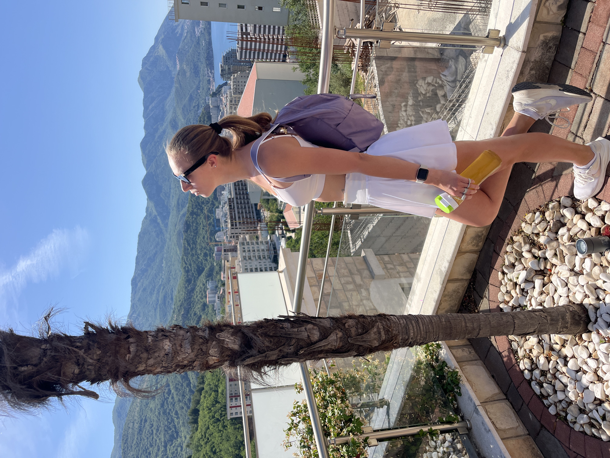Woman in athletic wear spotted on Montenegro patio