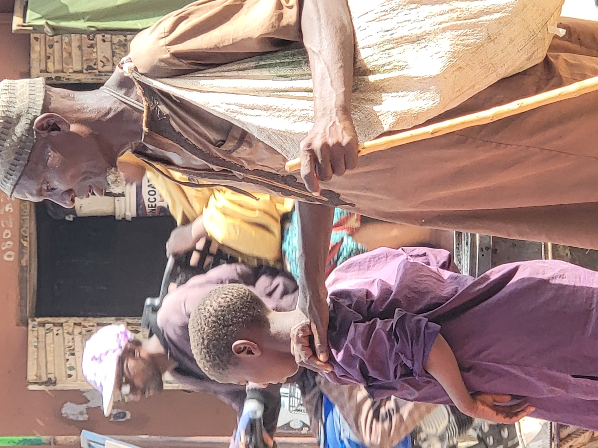 Daily life unfolds in Nigerian market district