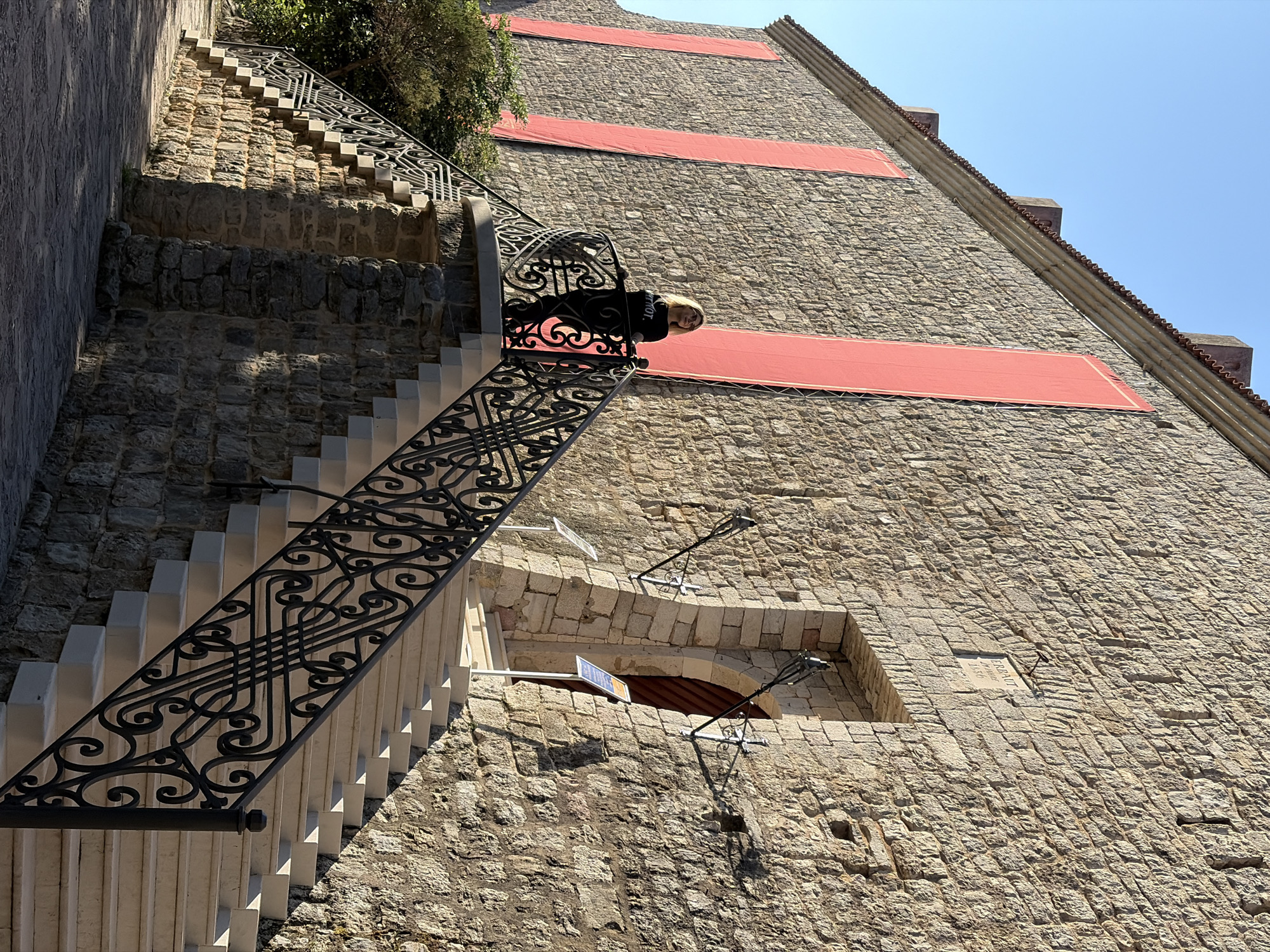 Tourist documents morning visit to historic Budva, Montenegro locations