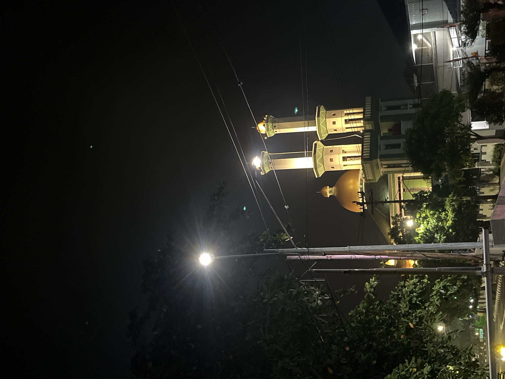 Pekalongan's mosque and church lit up at night