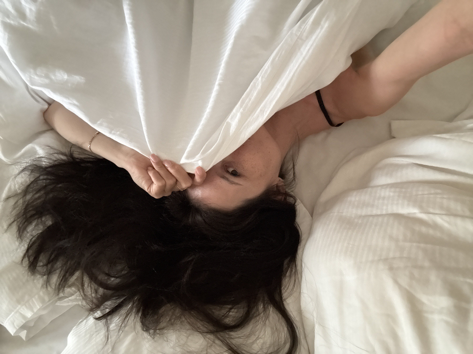Woman resting in bed observed in Safaga, Egypt